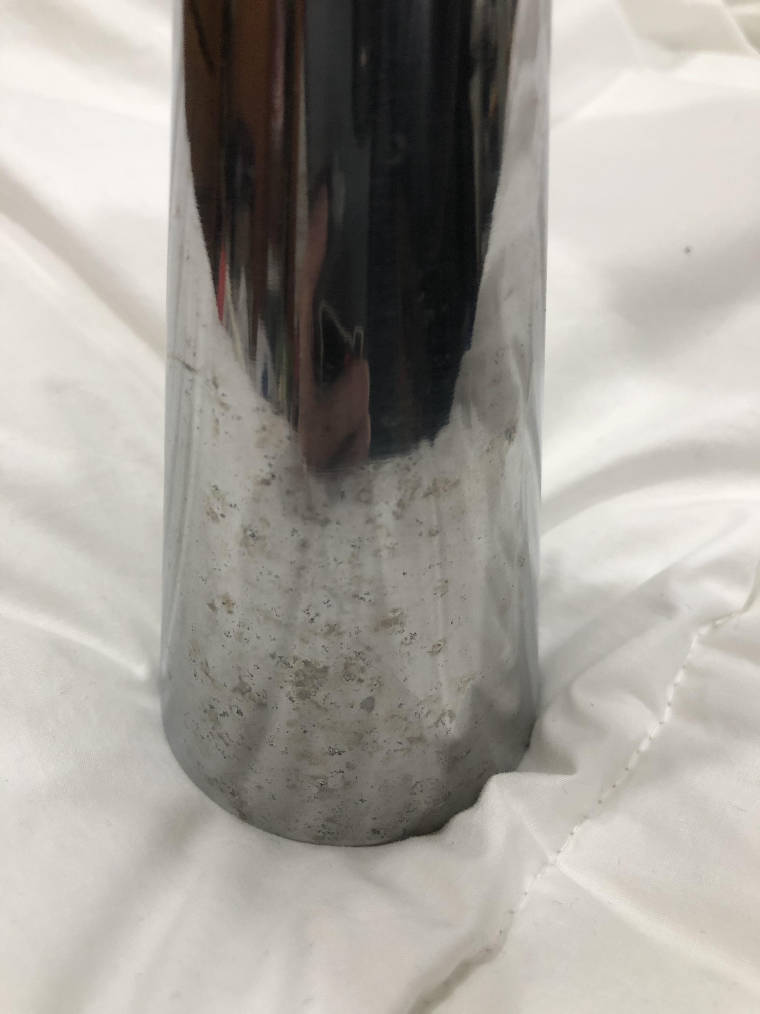 How to clean the spots off these vintage metal candlesticks? I tried