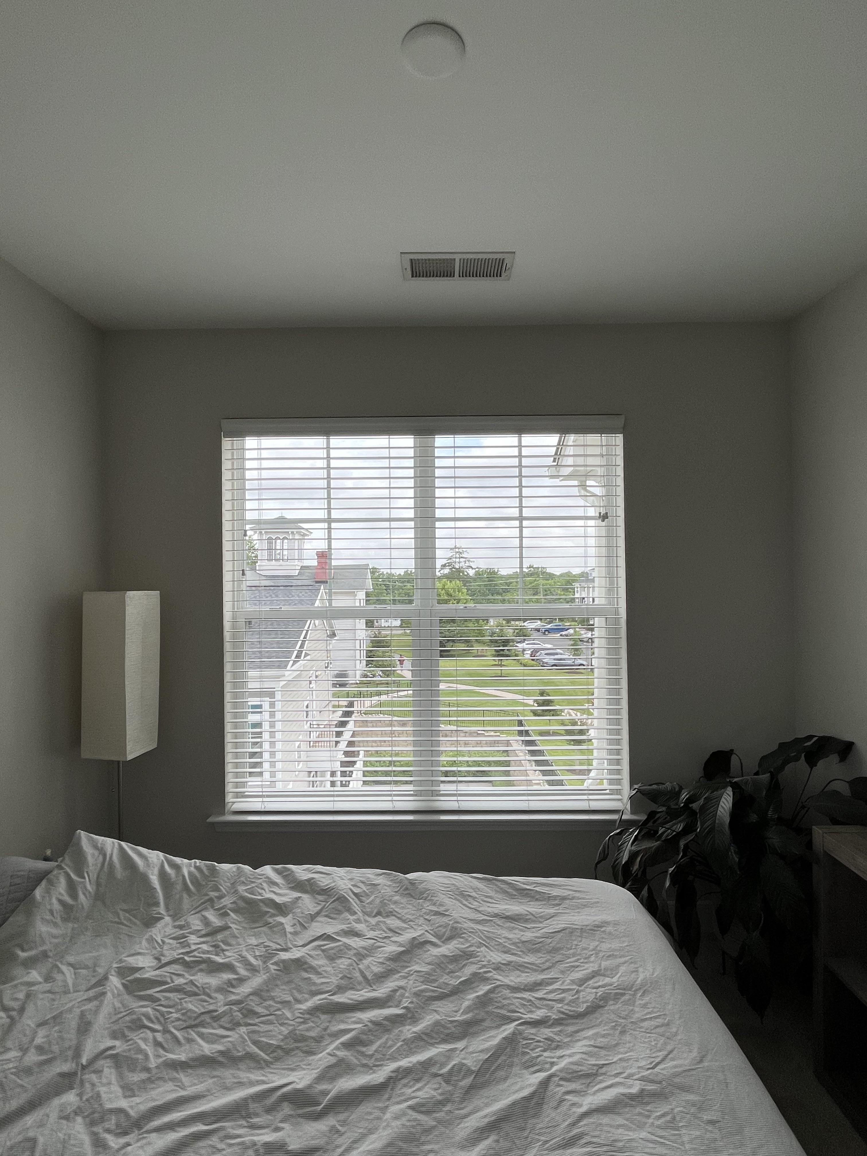 Offcentered window how should I hang my curtain? Centered on the wall or based on window? r