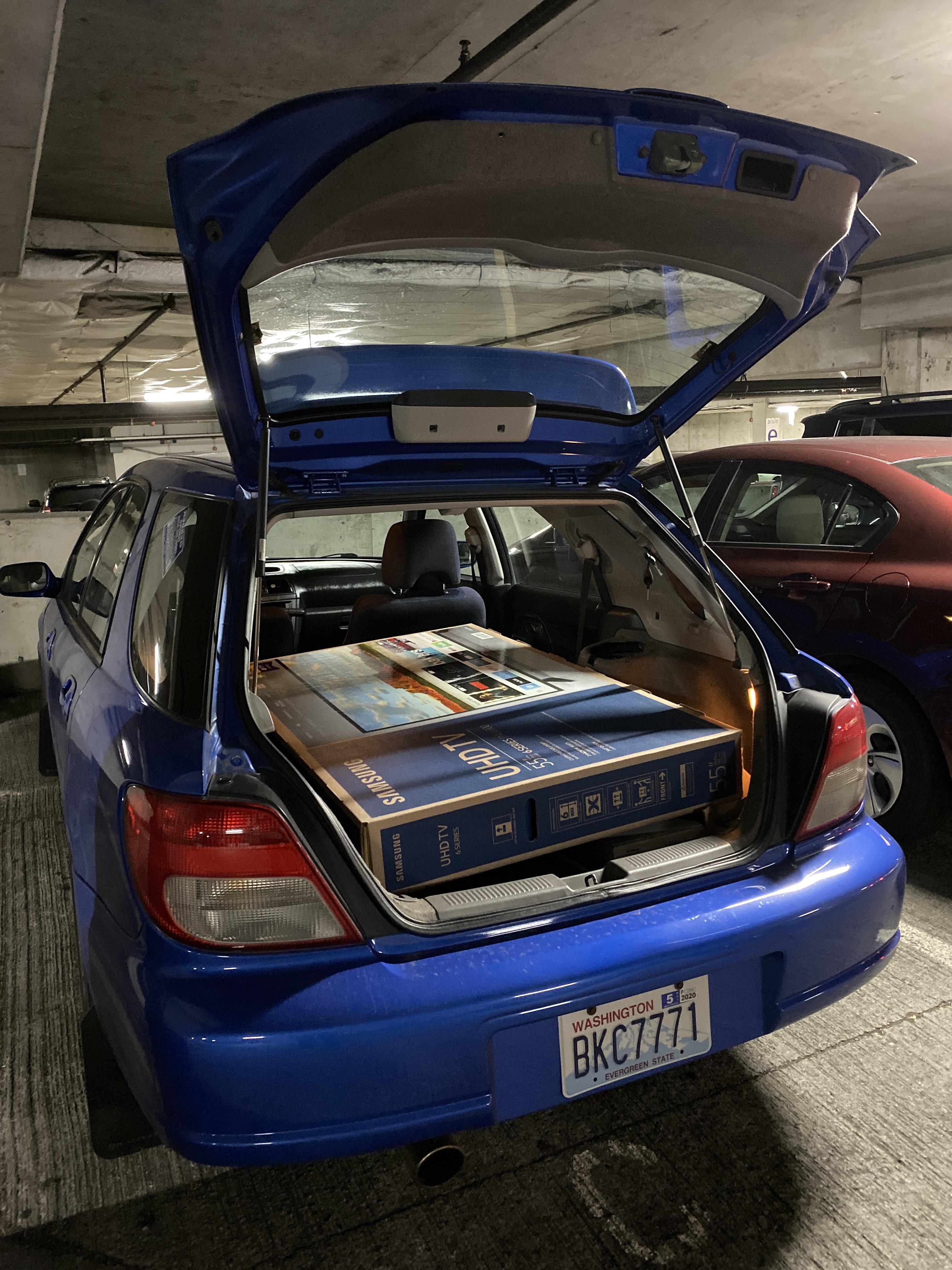 Learned that a 55 inch tv fits in a wagon like a glove. r/WRX