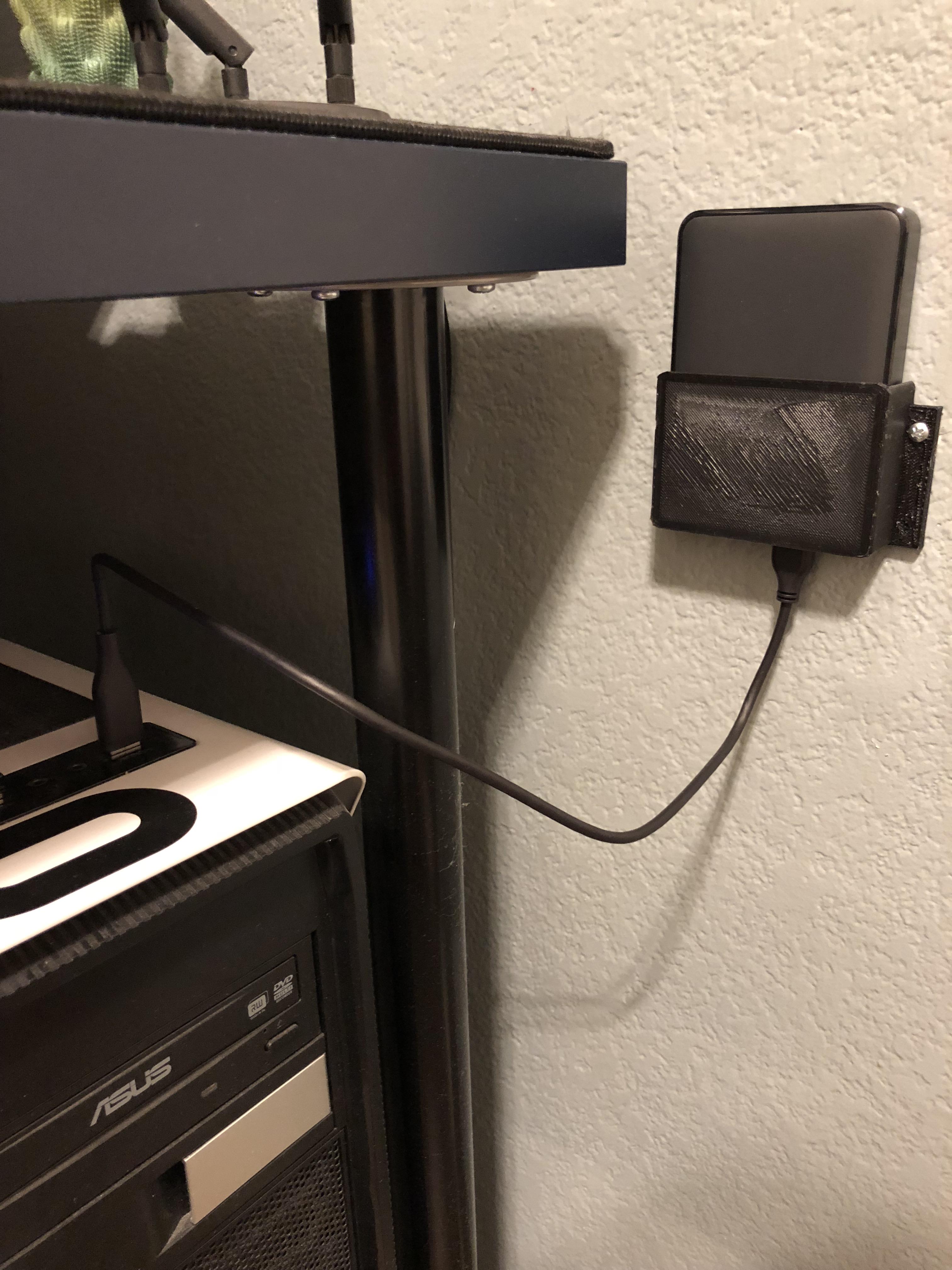 Designed and Printed this wall mount for my Western Digital 4Tb