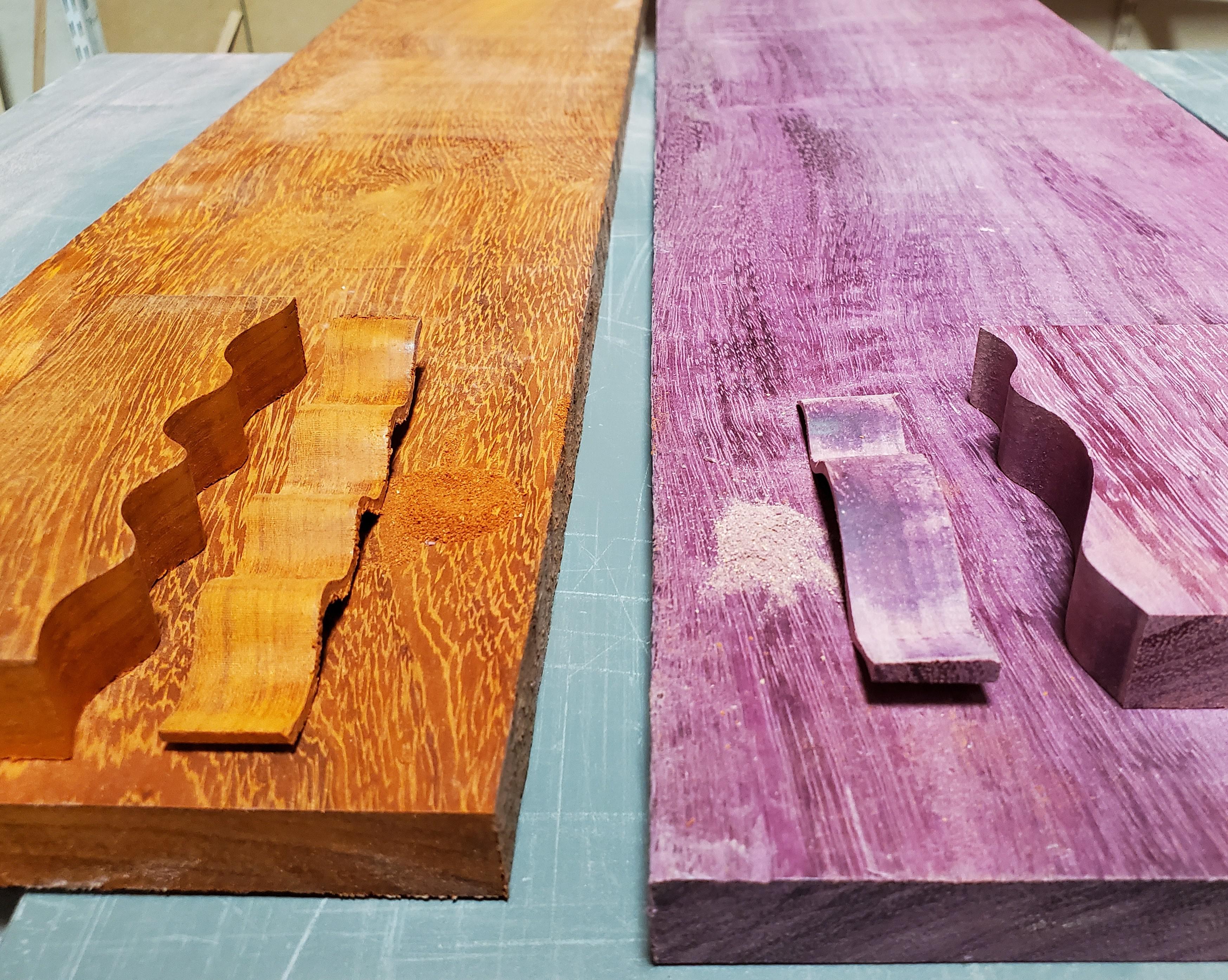 African Padauk and Purple Heart. The woods are naturally colored orange