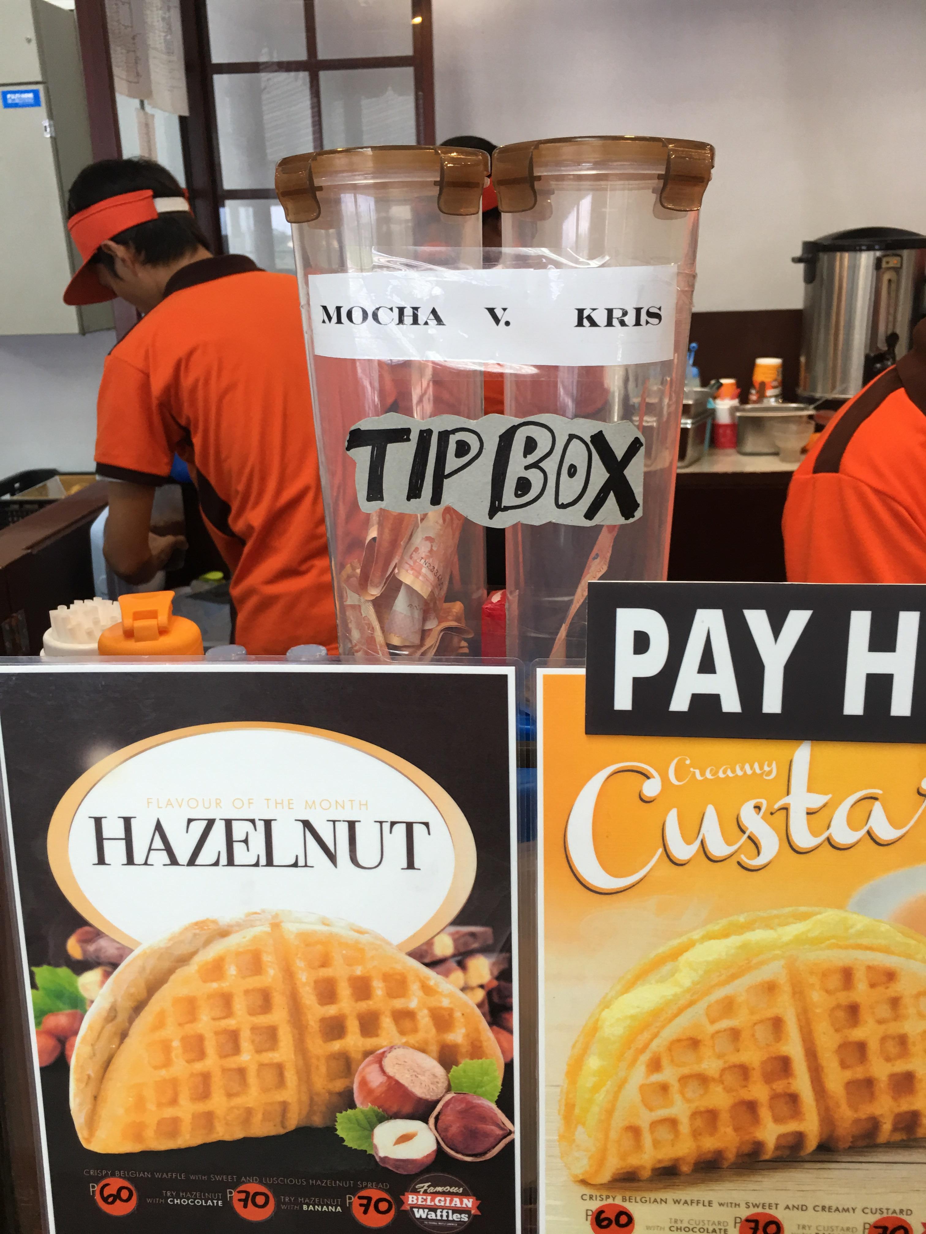 Interesting tip box at a Belgian Waffle stand in an airport in Palawan