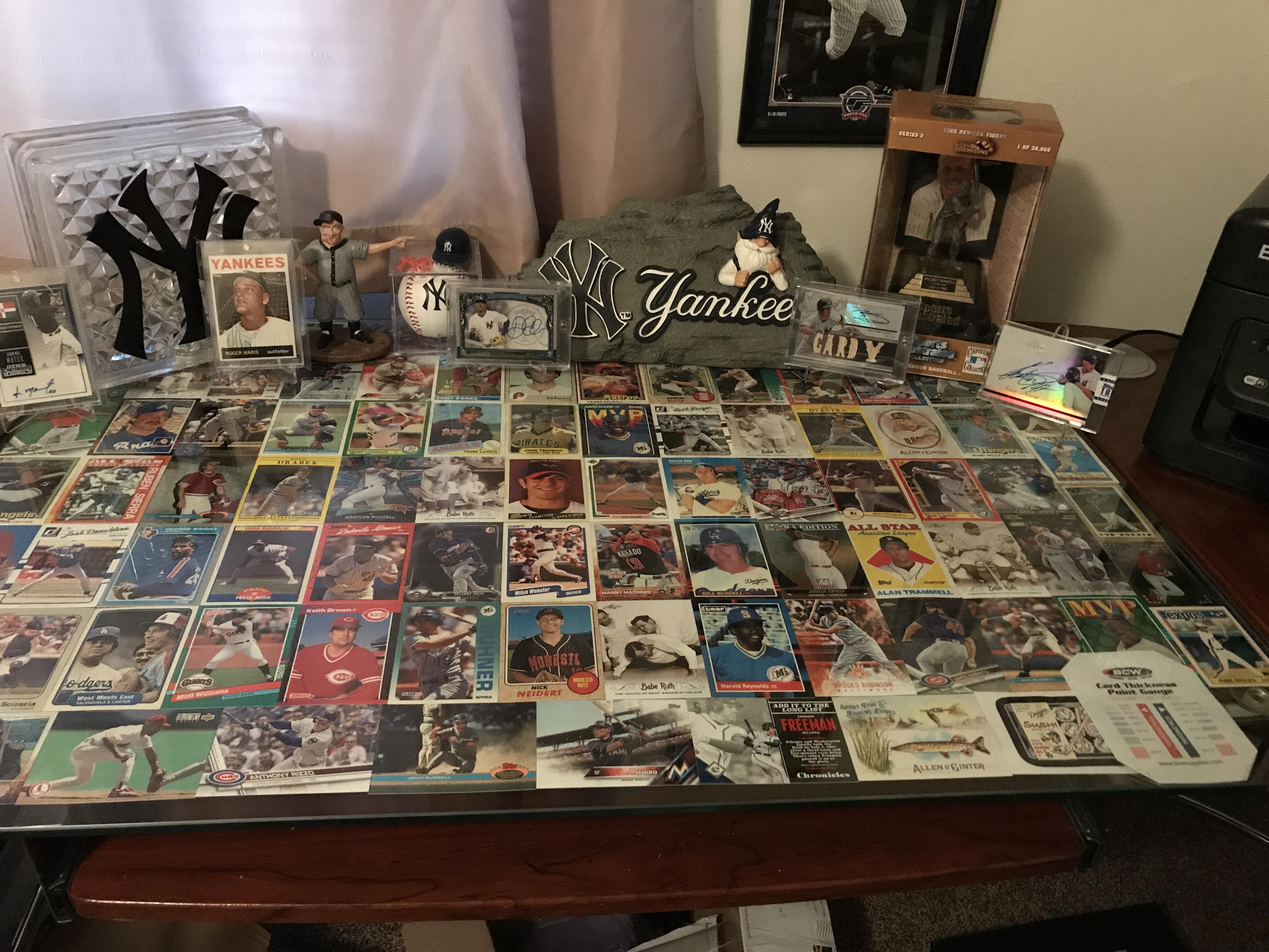 Repurposed some old baseball cards under my glass top desk. r
