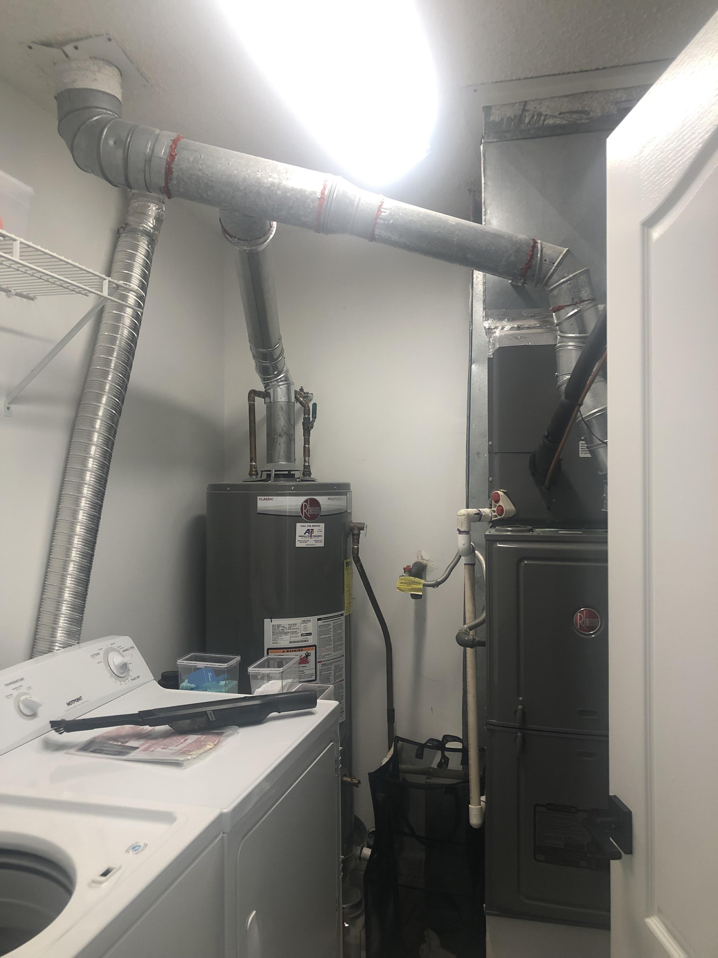 Any idea how I can hide/make look nicer the crazy pipes in my laundry