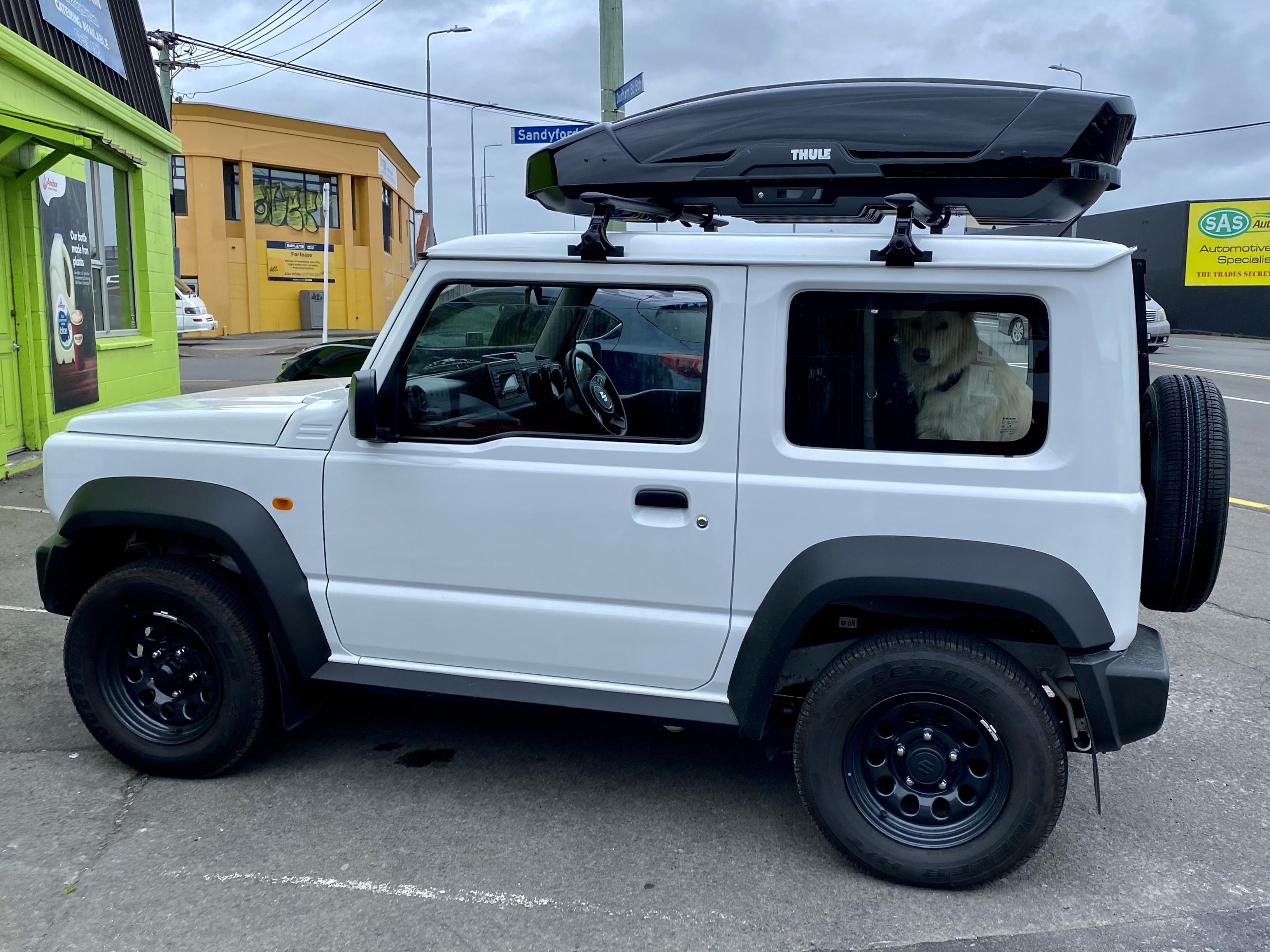 I decided to get lightweight load bars and a roof box rather than a fullsized roof rack r/Jimny