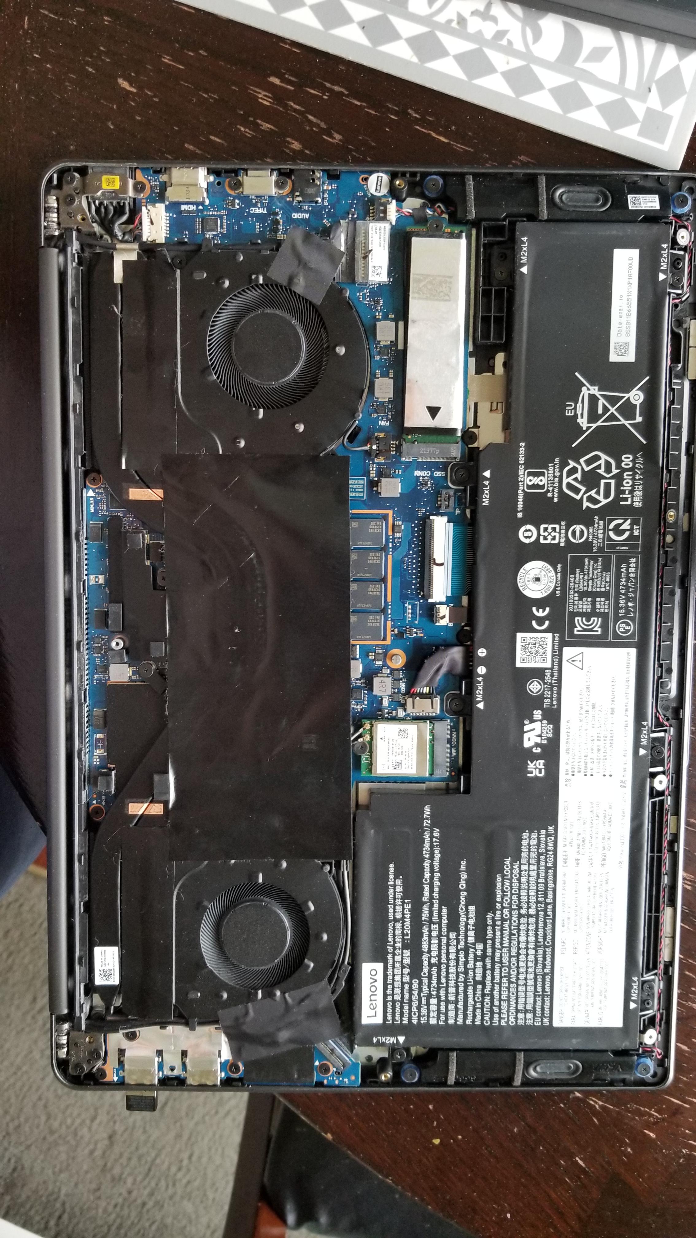 What is the black tape covering up the components for? r/laptops