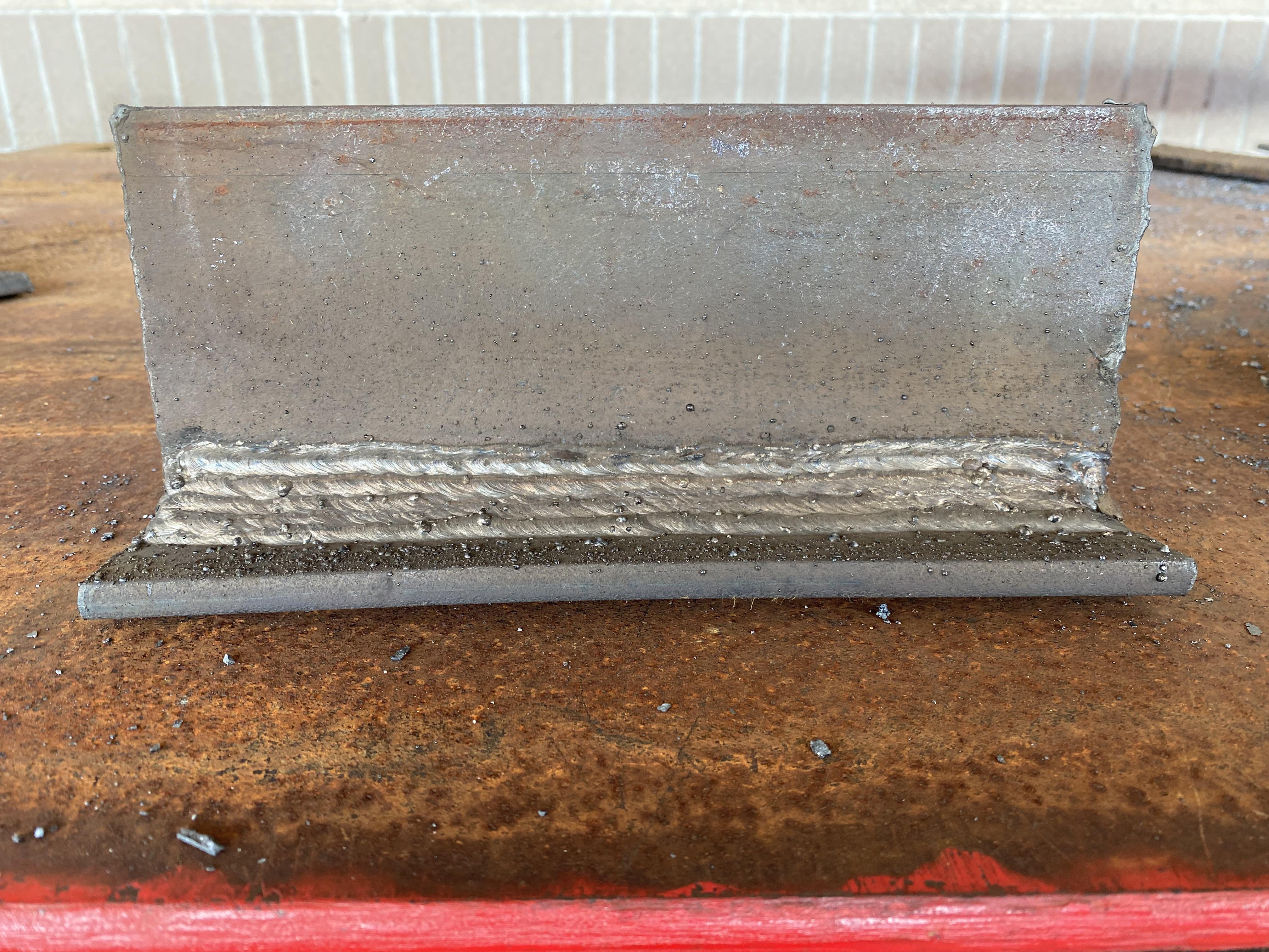 My final 7018 T joint weld. Time for vertical! Any tips on vertical are