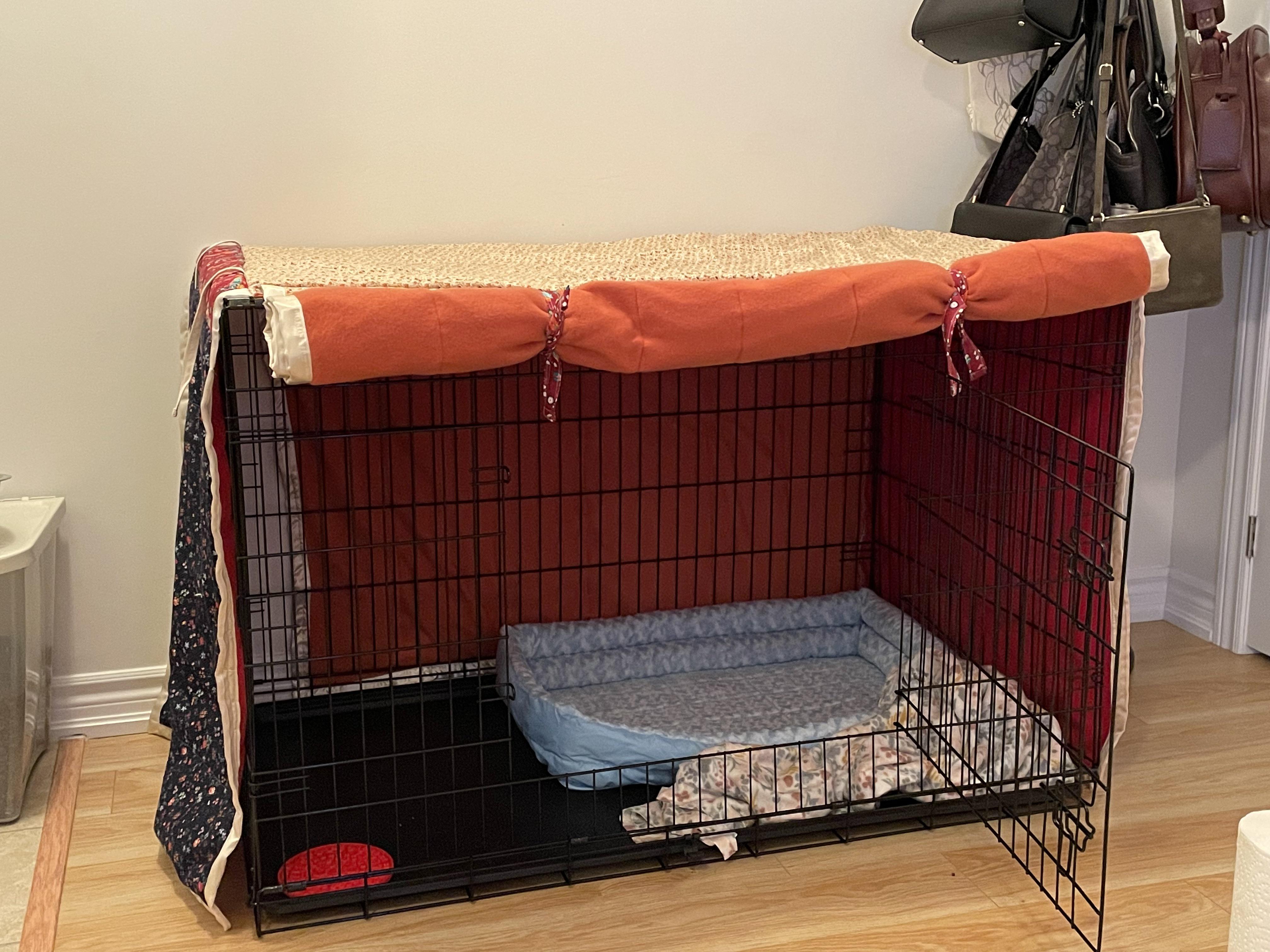 Sewed my dog a custom crate cover. The front and left side roll up
