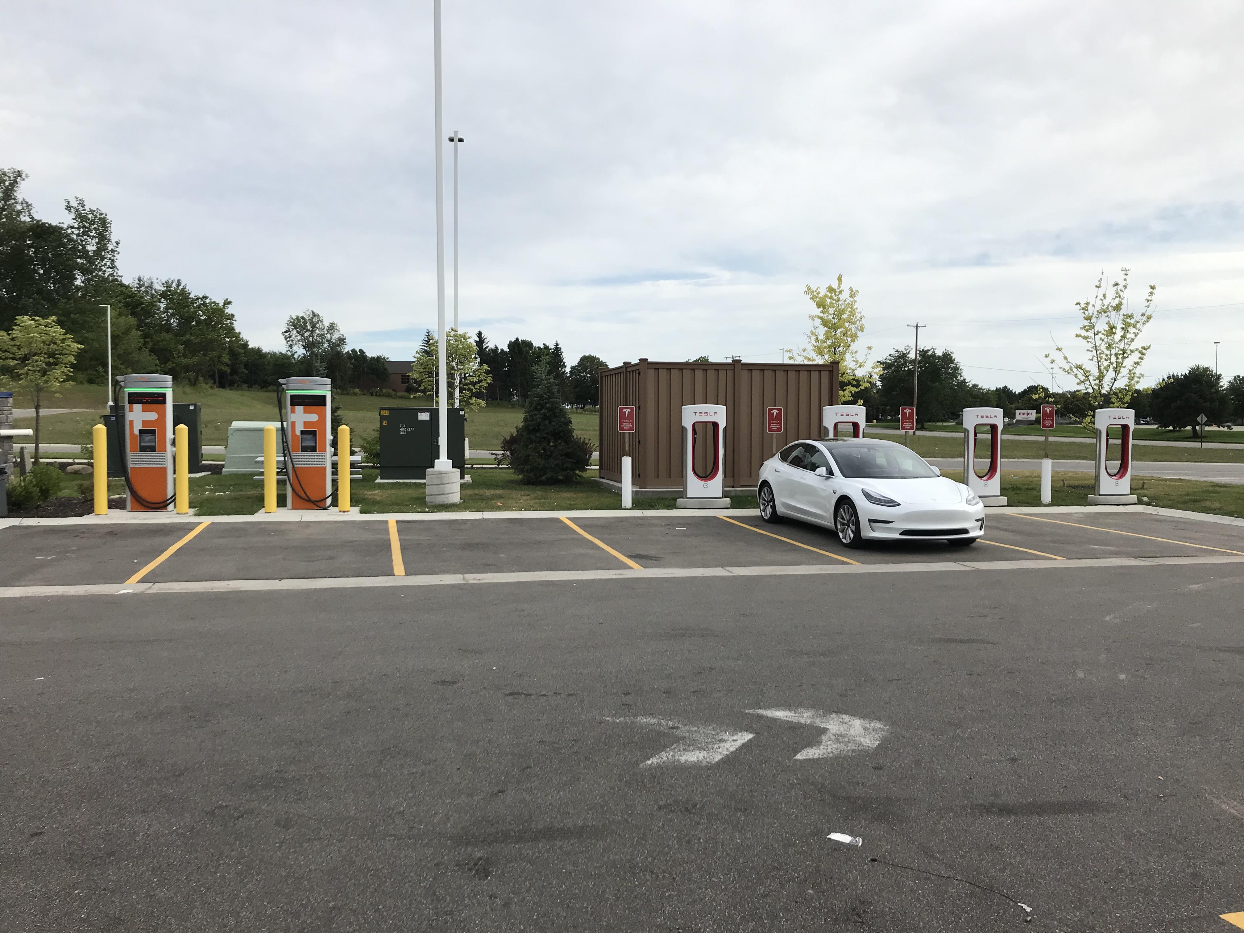 Superchargers and Charge Point at the same location. Grand Rapids, Mi