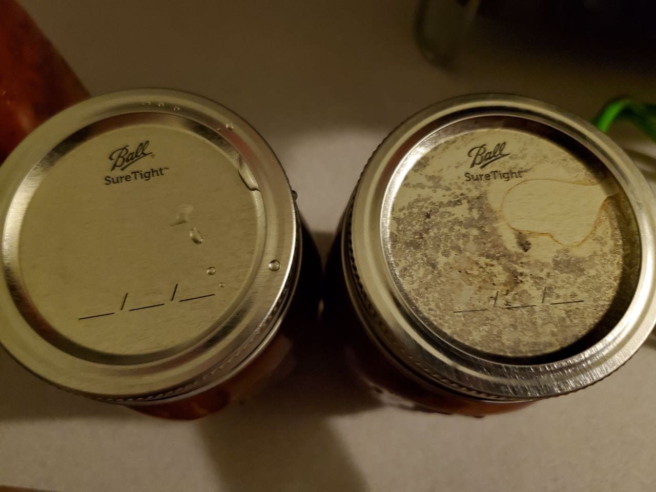 (First Time) Discoloration on only one can lid r/Canning