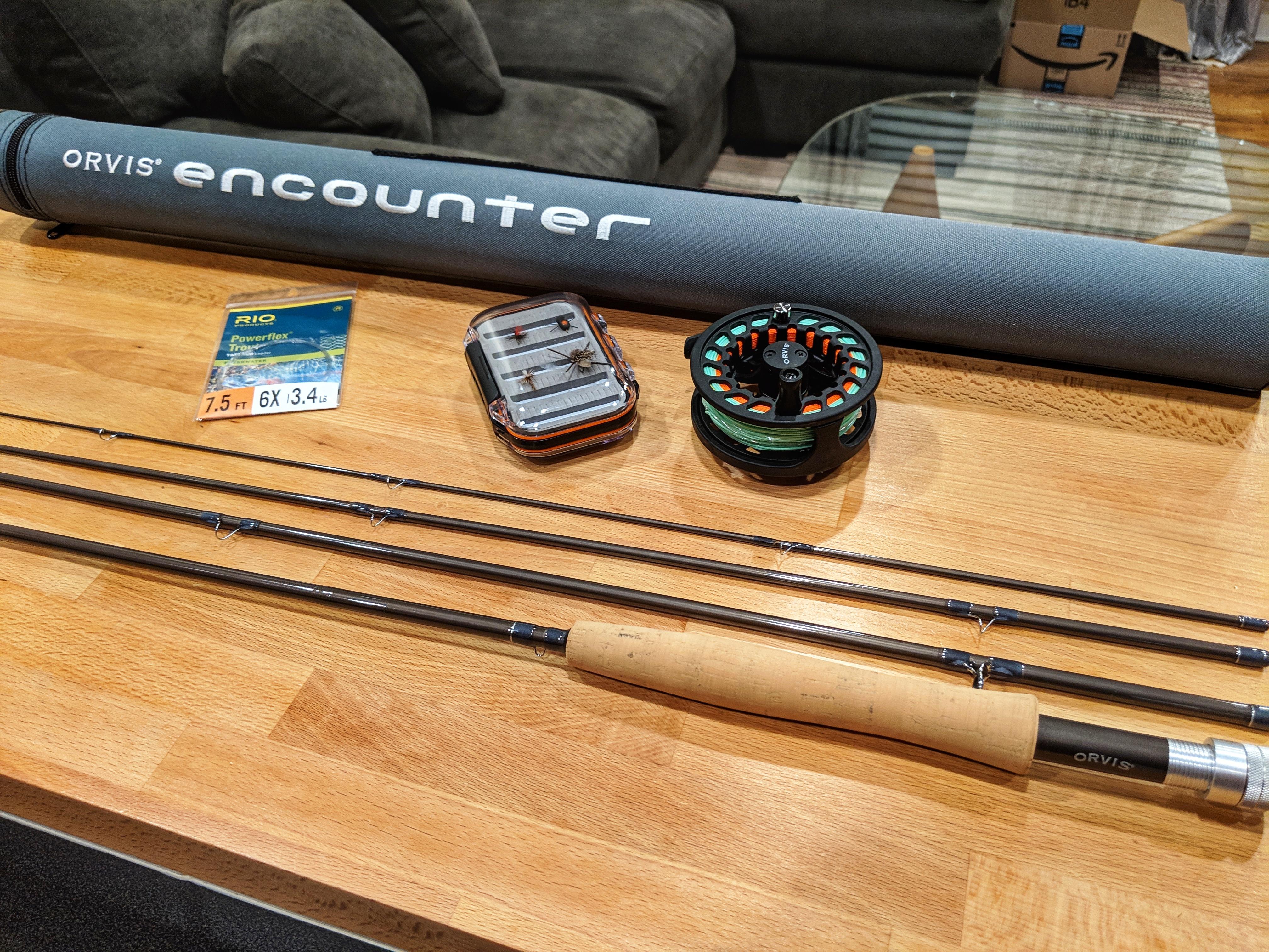 My first fly rod. Birthday gift from my girlfriend. I've got a keeper
