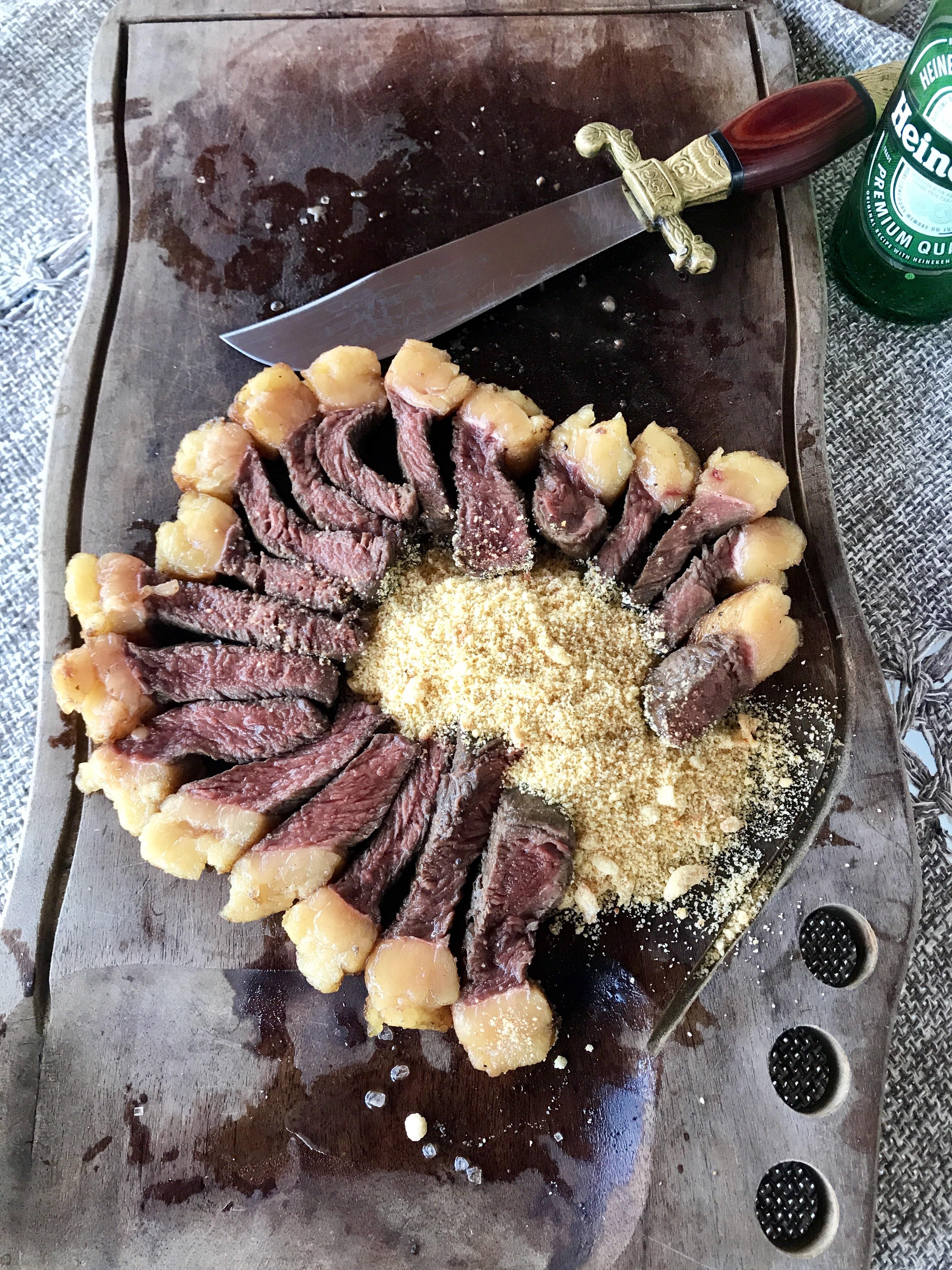 Brazilian barbecue picanha steaks served with farofa. r/BBQ