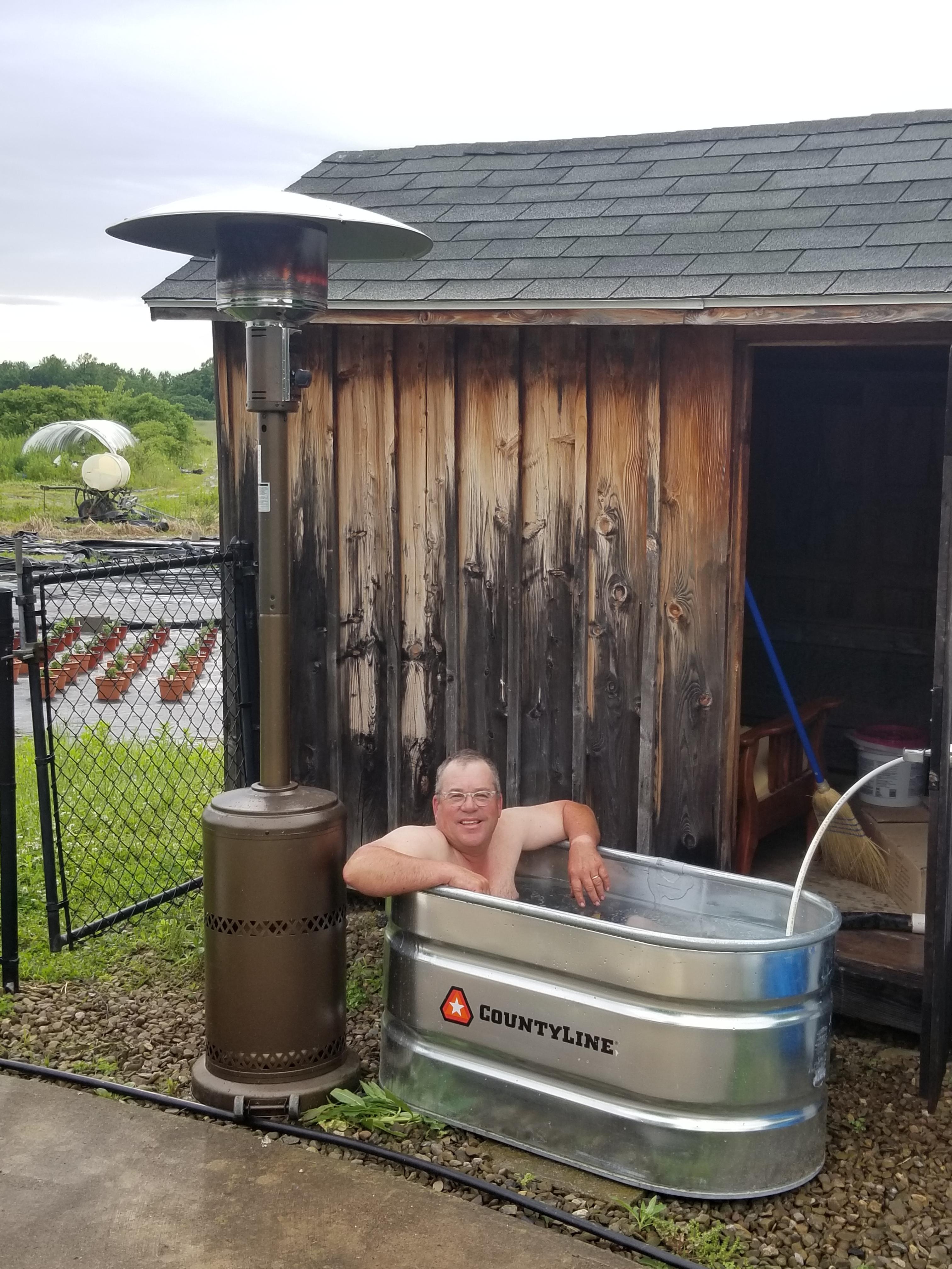 Cold, wet weather is beginning to effect this farmer. Hot tub stock