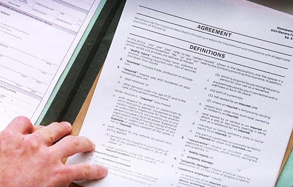 In The Truman Show (1998), Truman's job as an insurance salesman serves