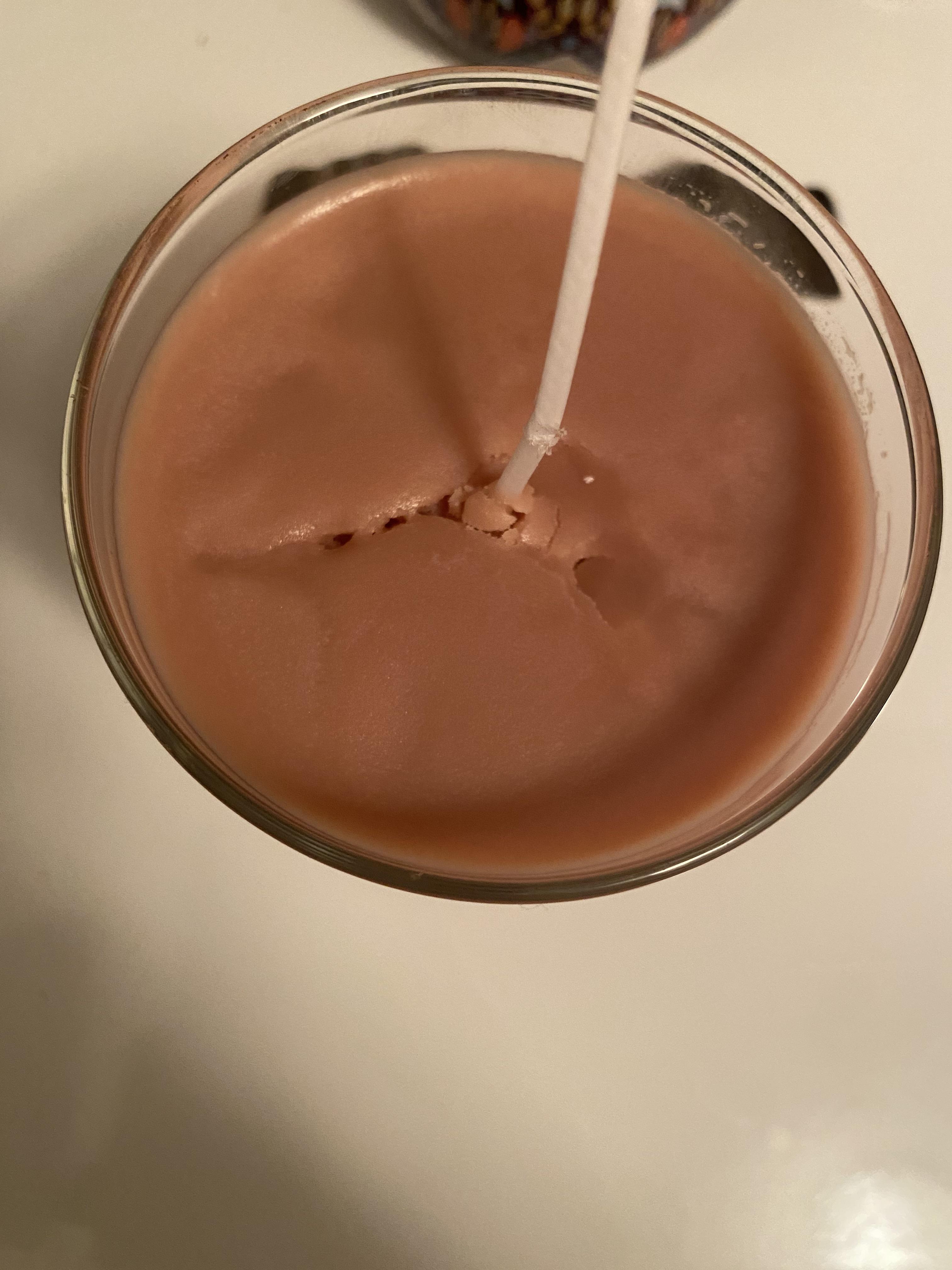 Second candle. What causes the wax to set like this? r/candlemaking