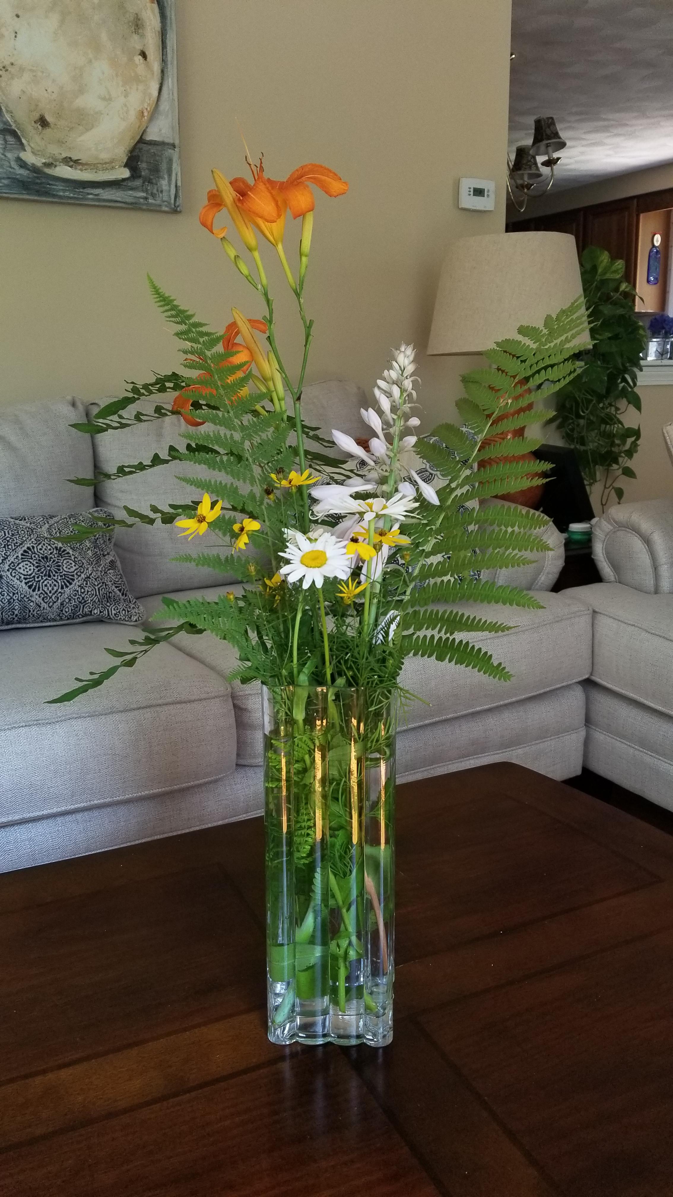 Quick arrangement from the gardens. Hosta flowers, Shasta daisies