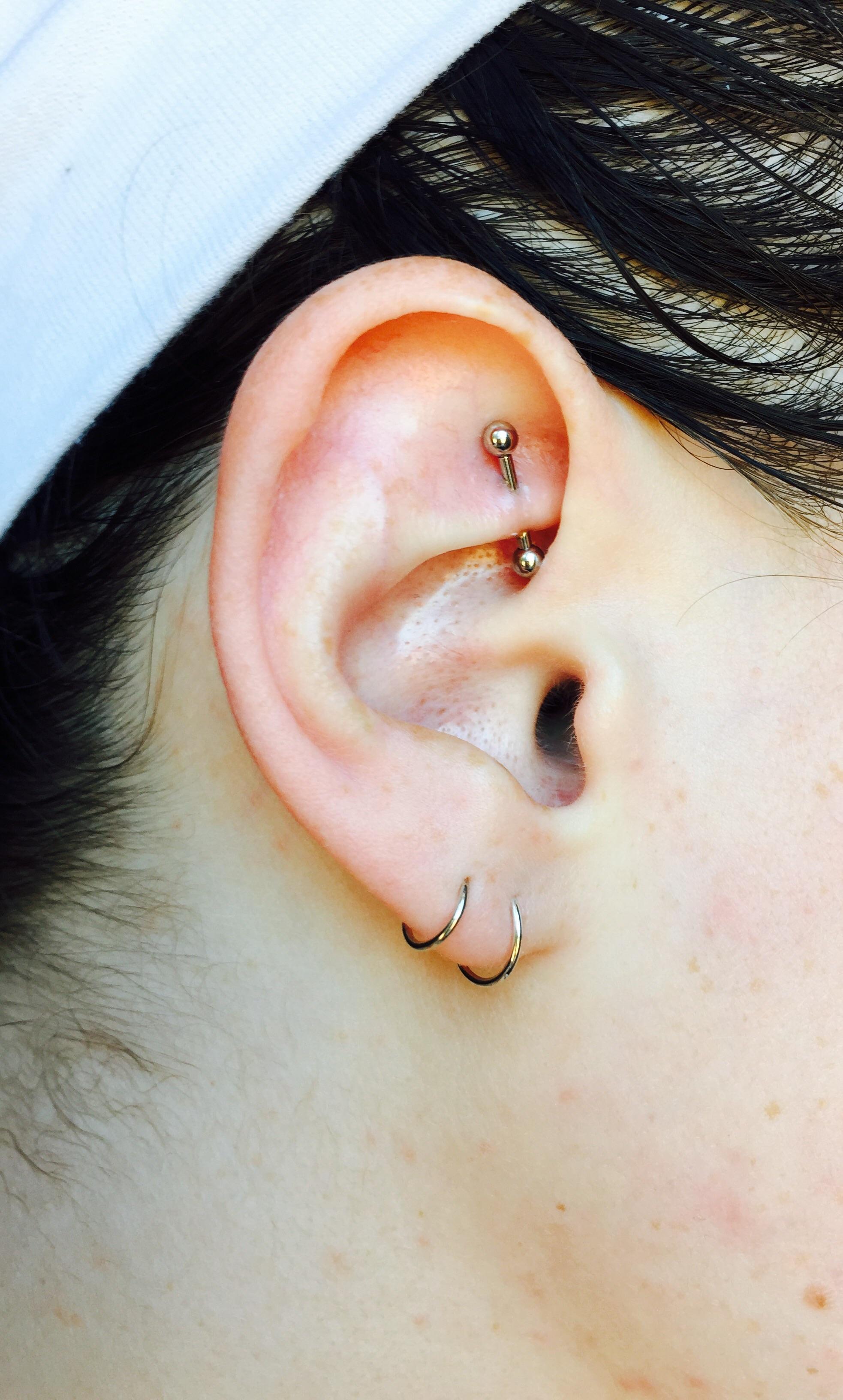 Got a rook piercing over the weekend...should I take it out, let it heal and get it repierced