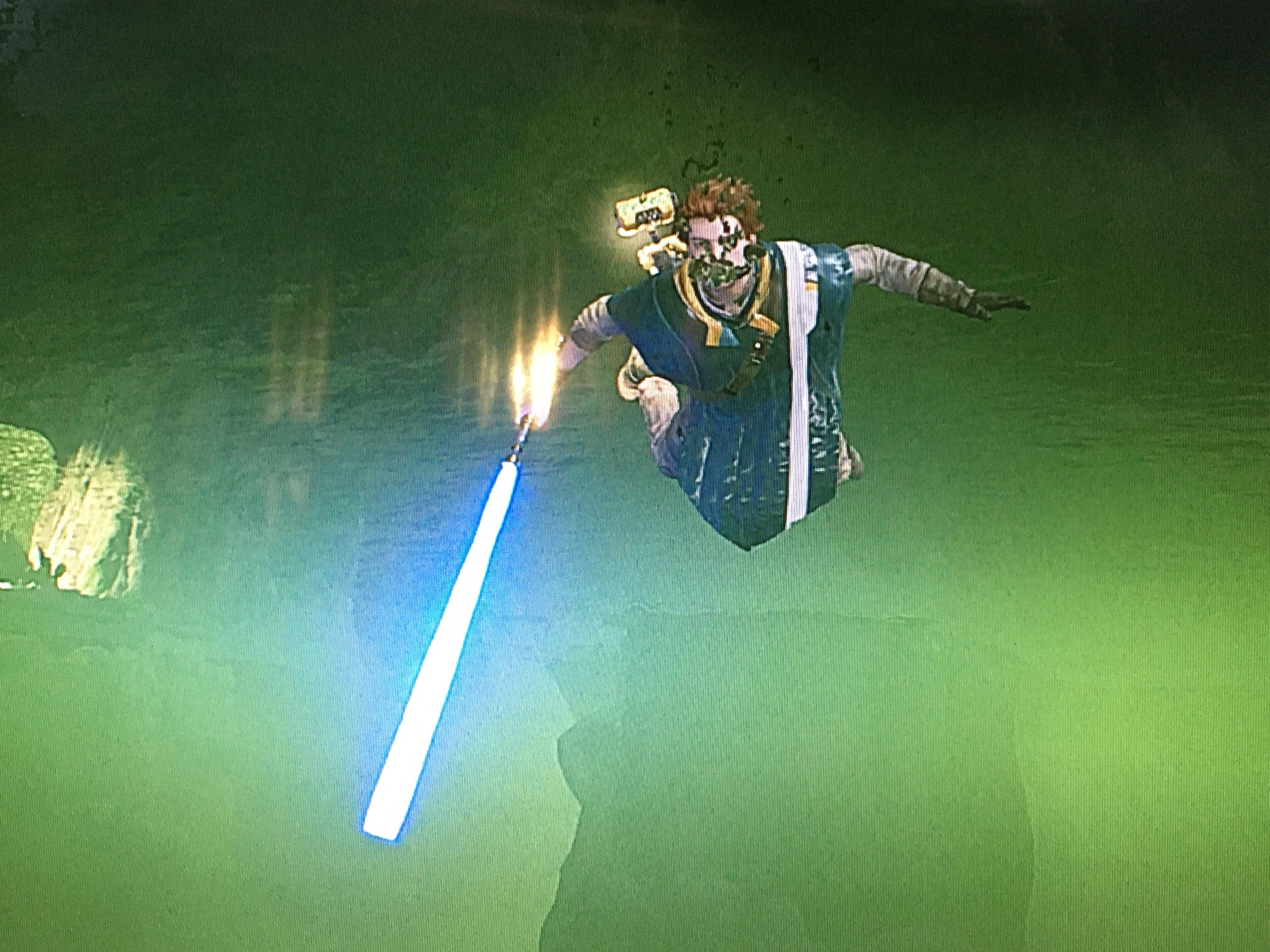 On the 3rd play through I found out how to ignite the lightsaber