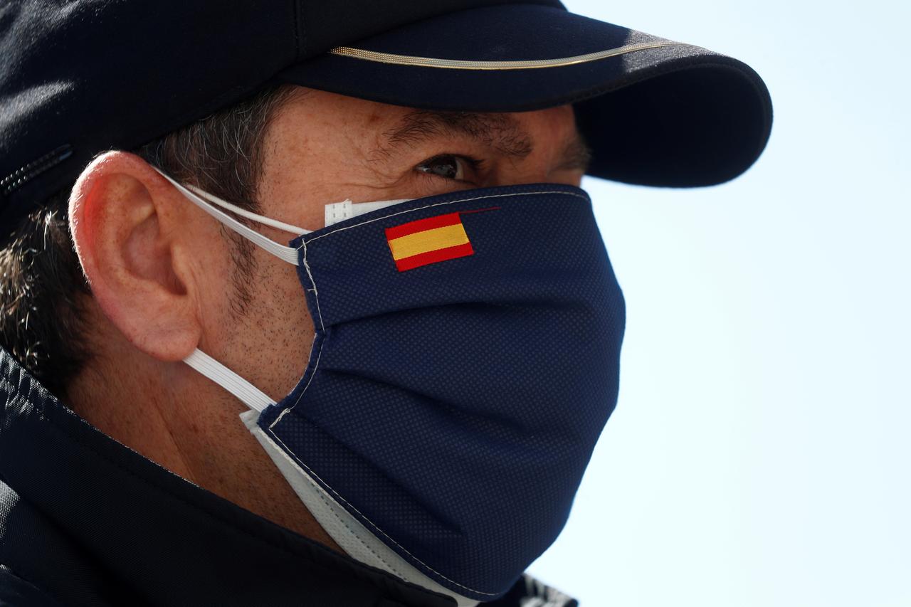 Is it worth wearing two masks, like this Spanish man is doing, or is