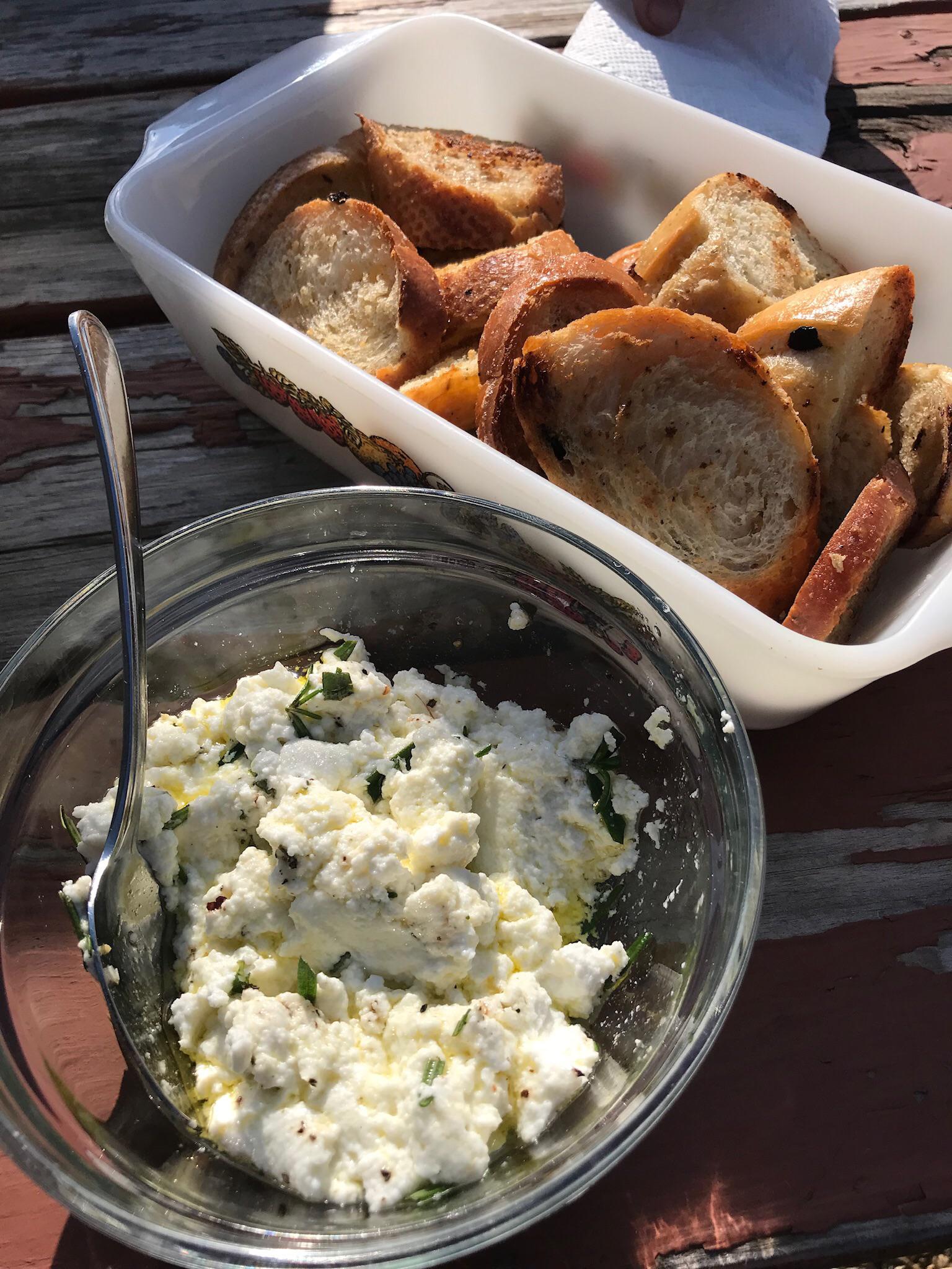 Homemade goats milk ricotta with rosemary, olive oil and toasted
