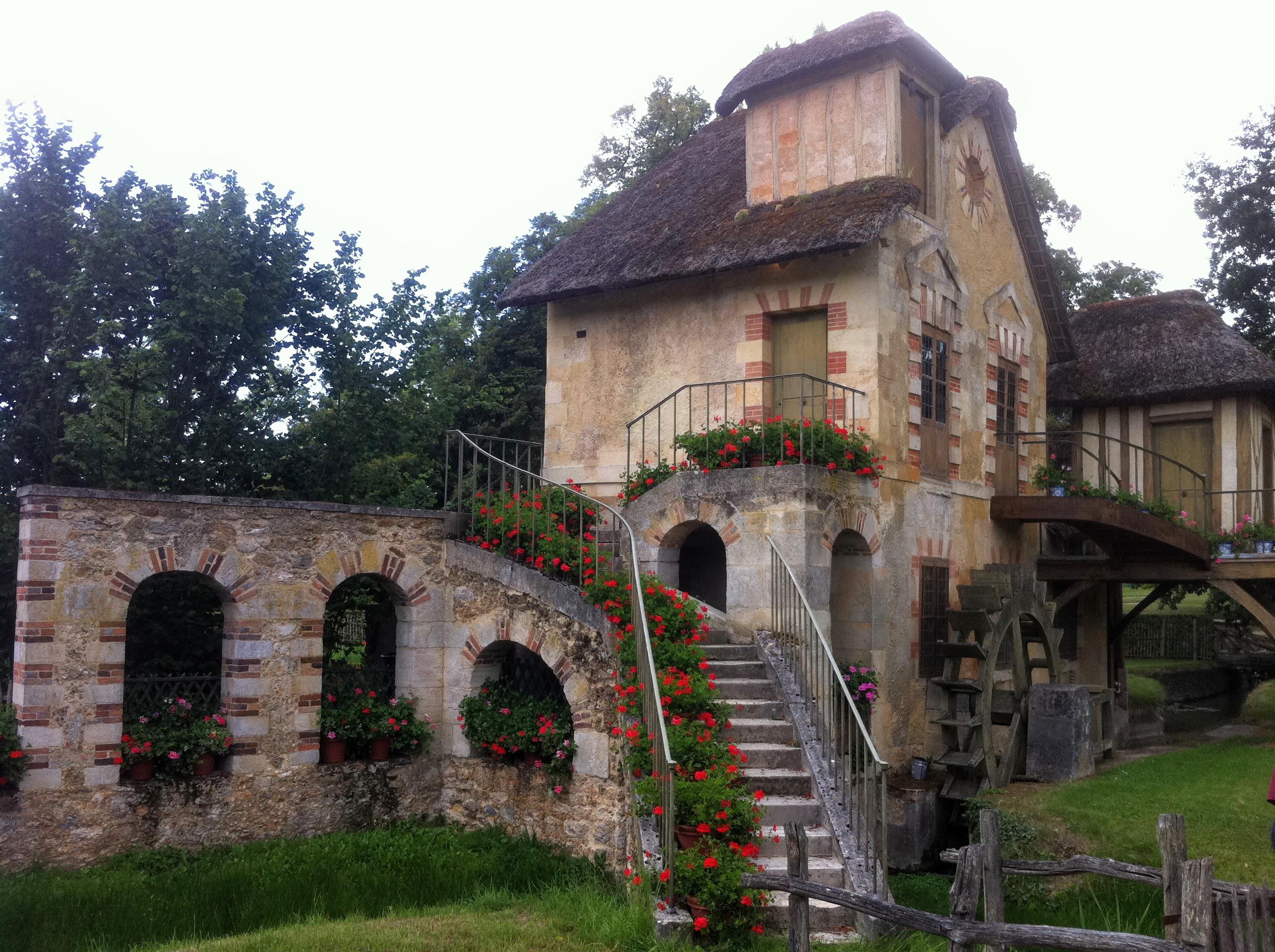 Marie built an entire mock peasant village (the Hameau de