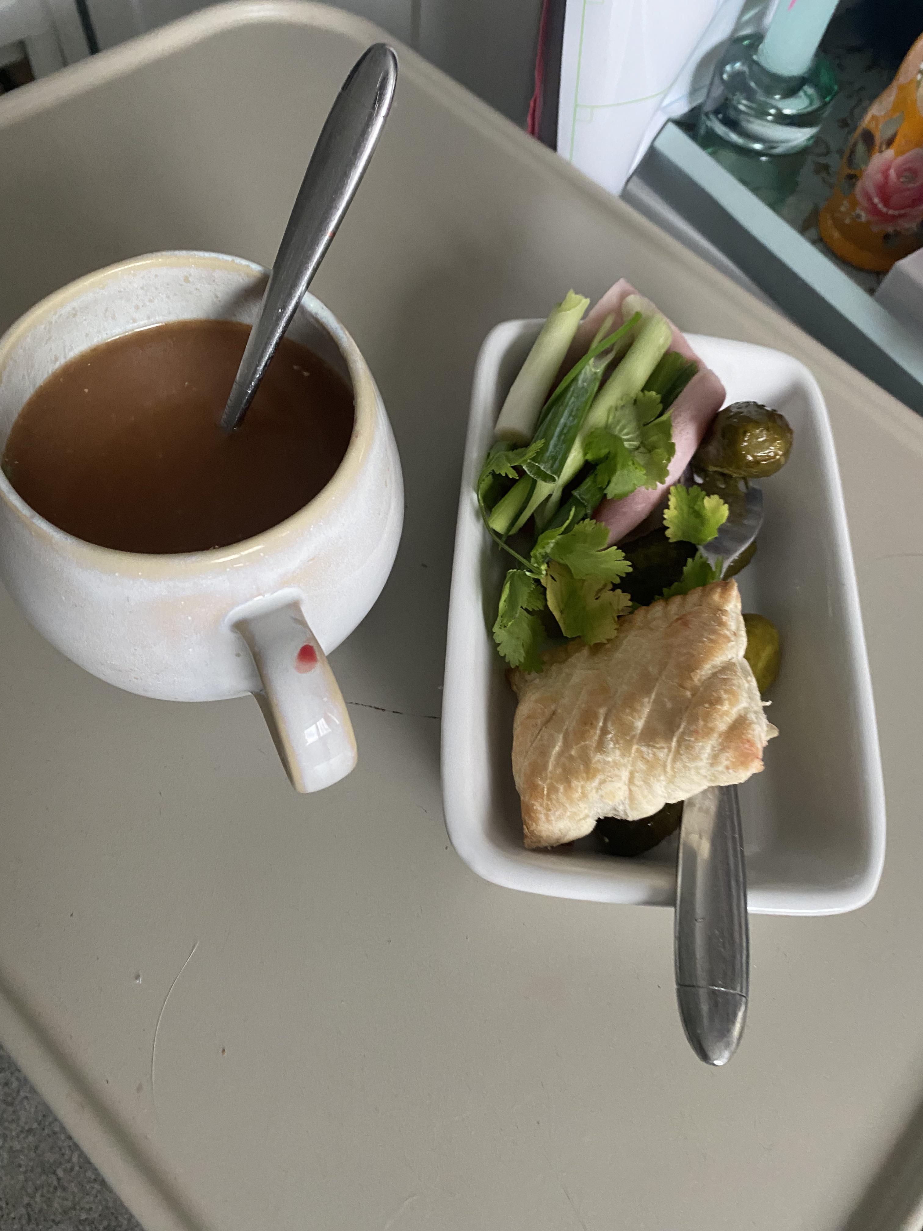 Oxtail cup soup with a splash of milk. My blood on the handle because I