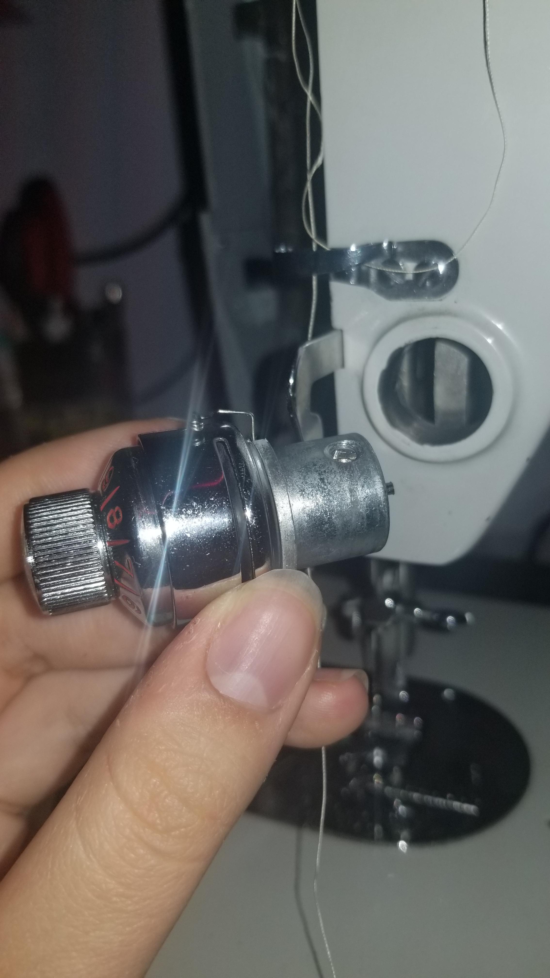 sewing machine help! grandma's machine, upper tension dial fell out and
