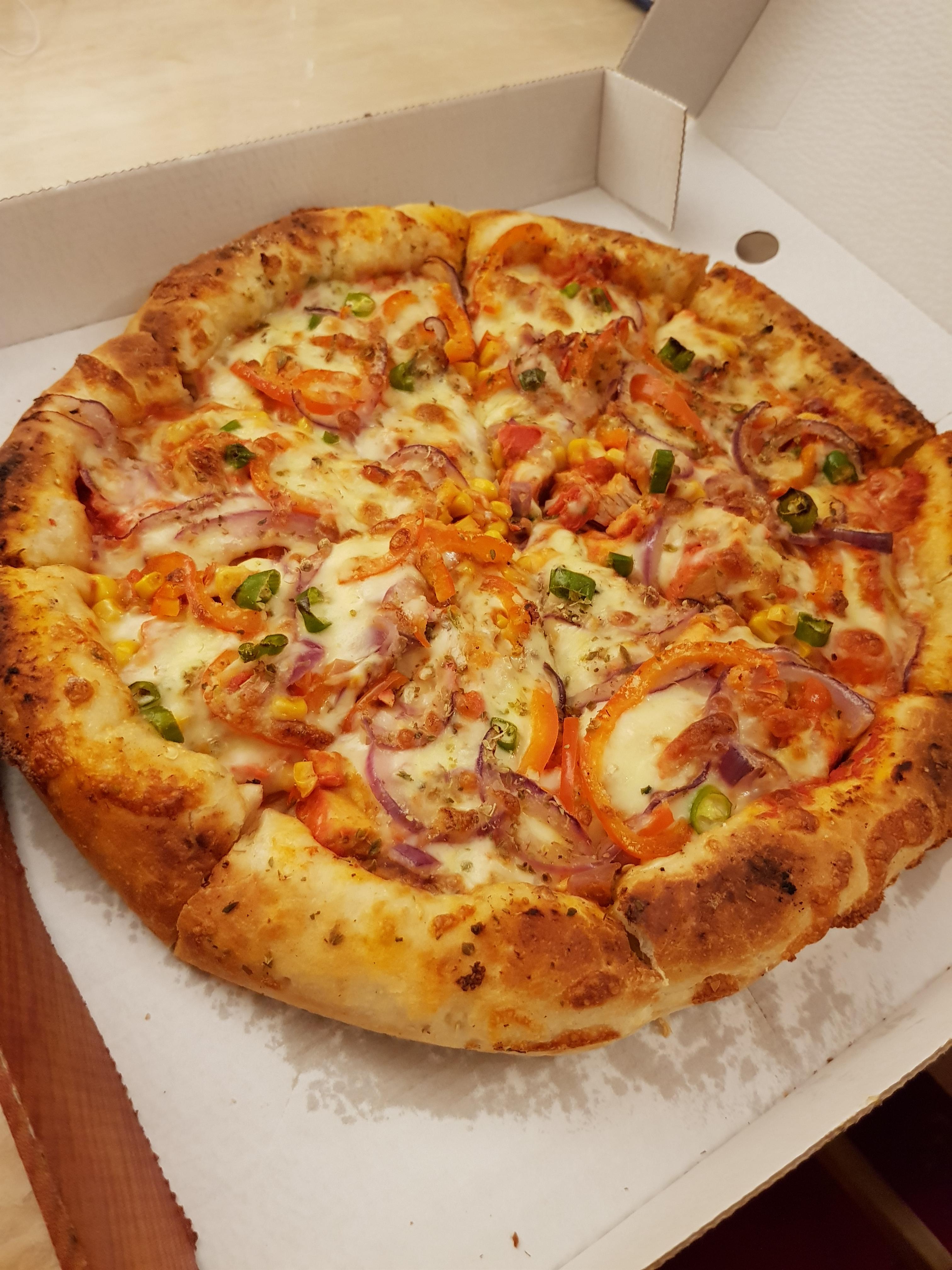 Indian style pizza made in our takeaway r/Pizza