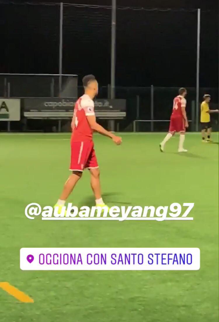 Aubameyang is playing pick up football in a small field right in front