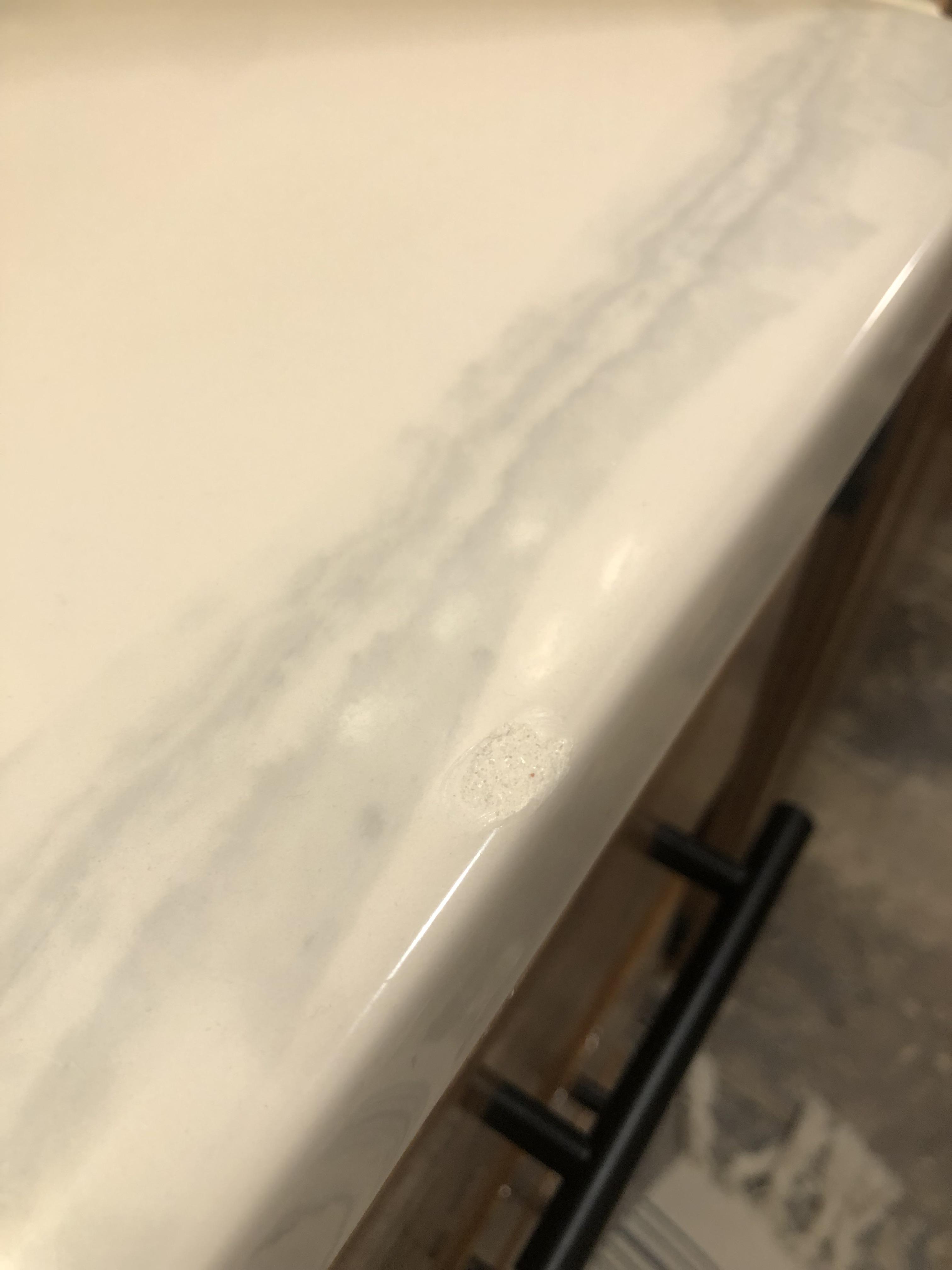 Just installed a new cultured marble vanity top when I noticed it was