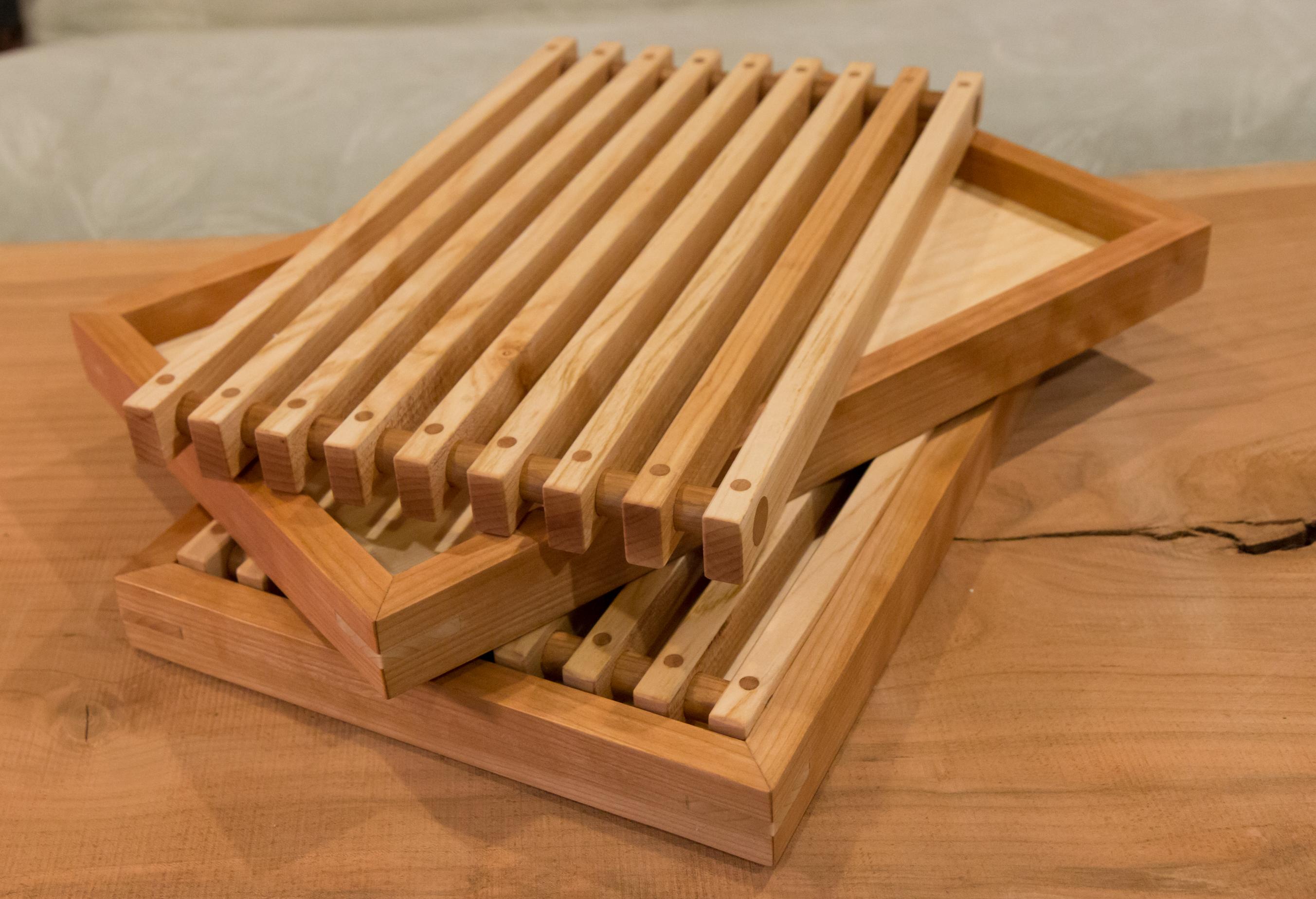 I made a couple of bread boards with crumb trays. Cherry and maple. r