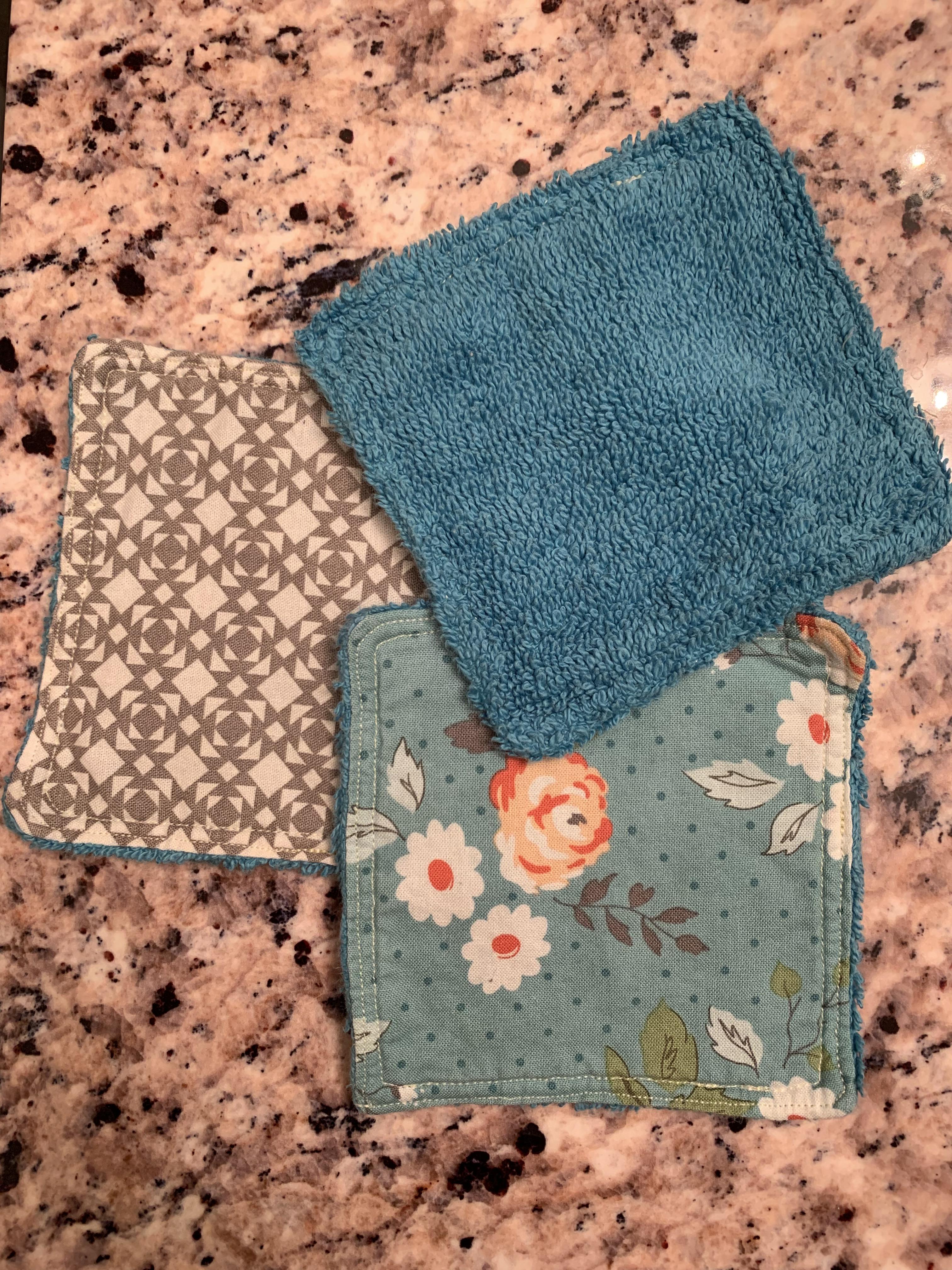 Reusable Makeup/Face Wipes made from an old stained towel and some fabric that i has sitting in