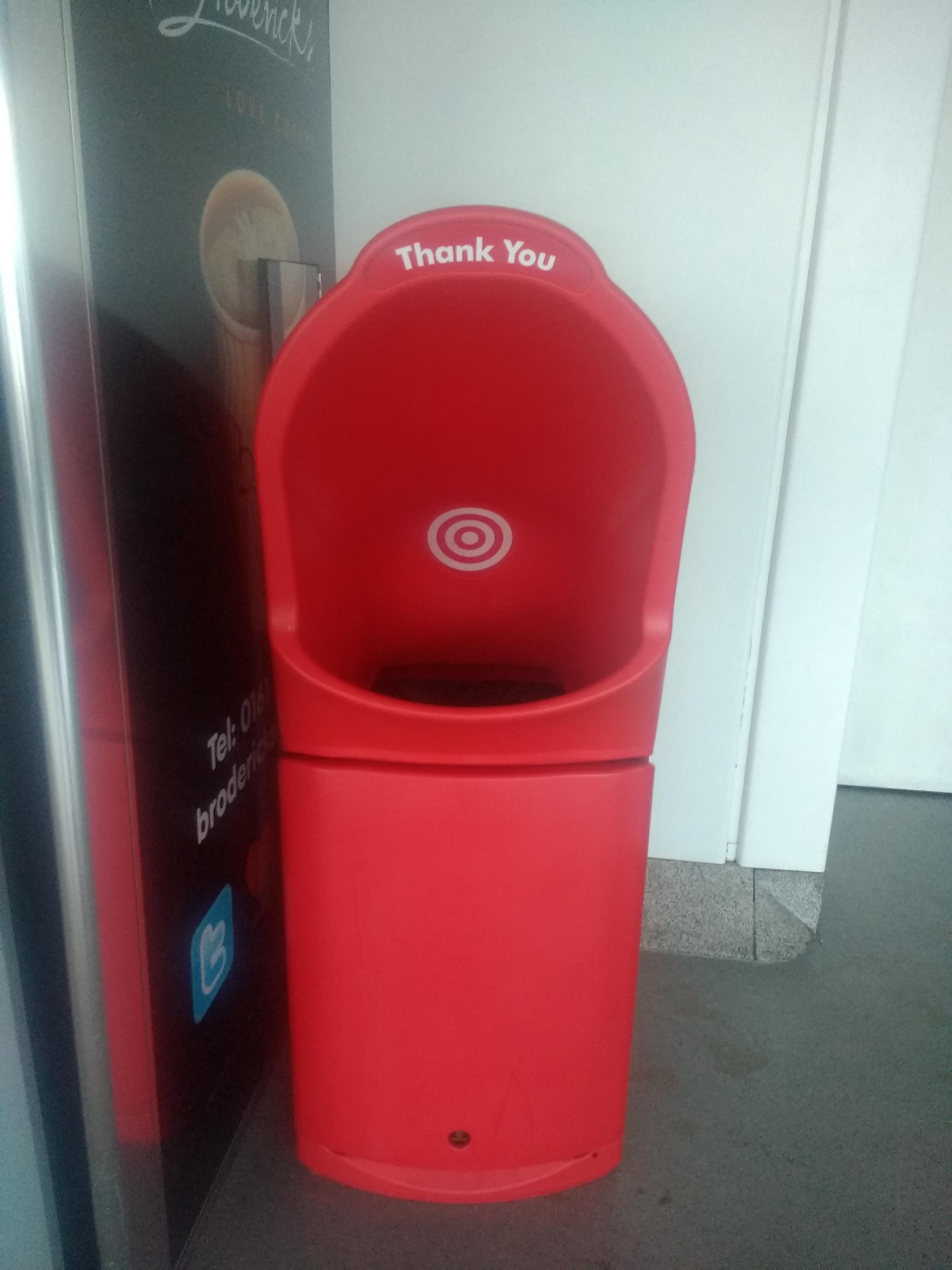 This bin at Manchester Airport has a target and wide opening to