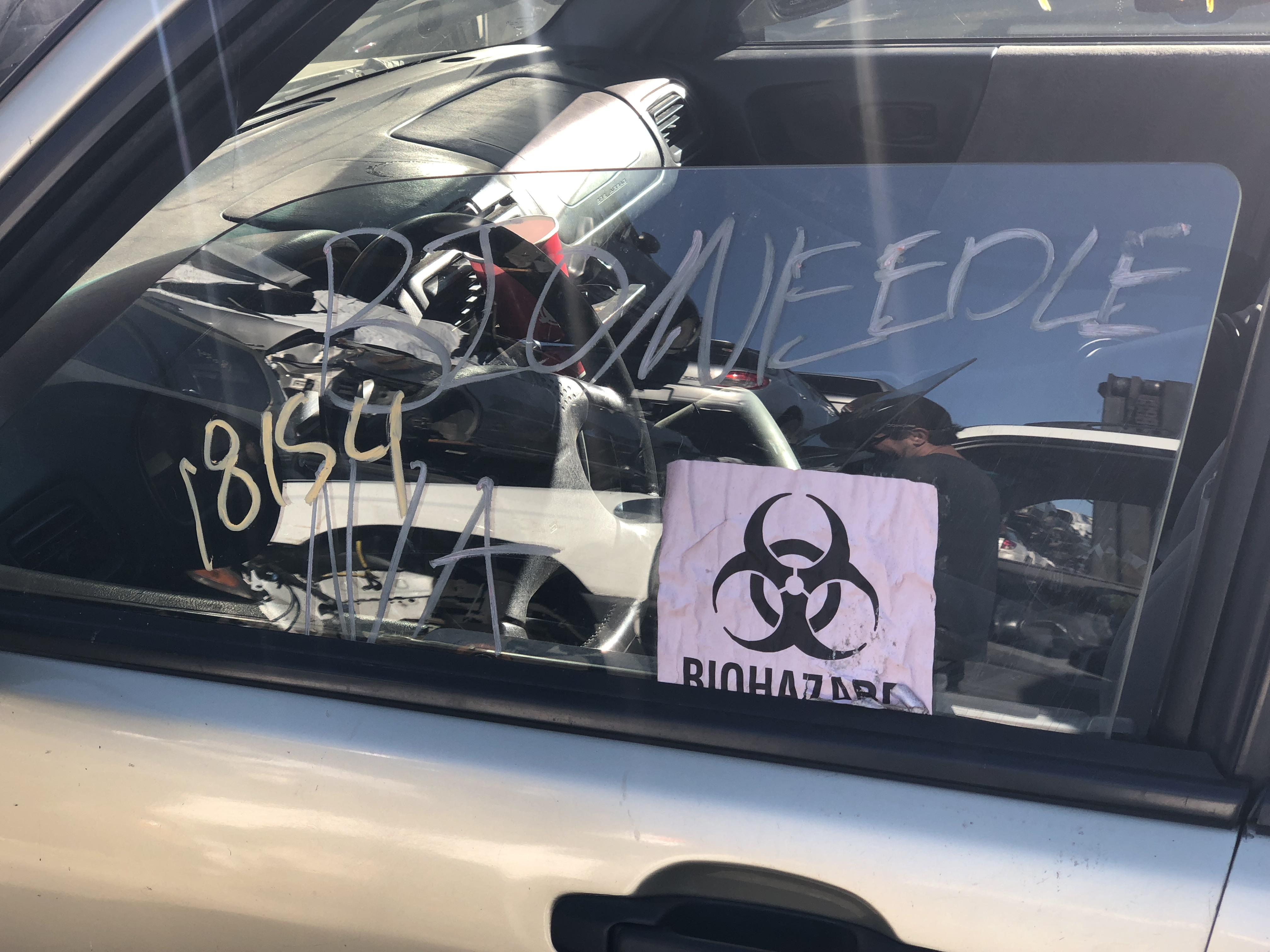 Does this count as a scary sign biohazard? Local junk yard r/ScarySigns