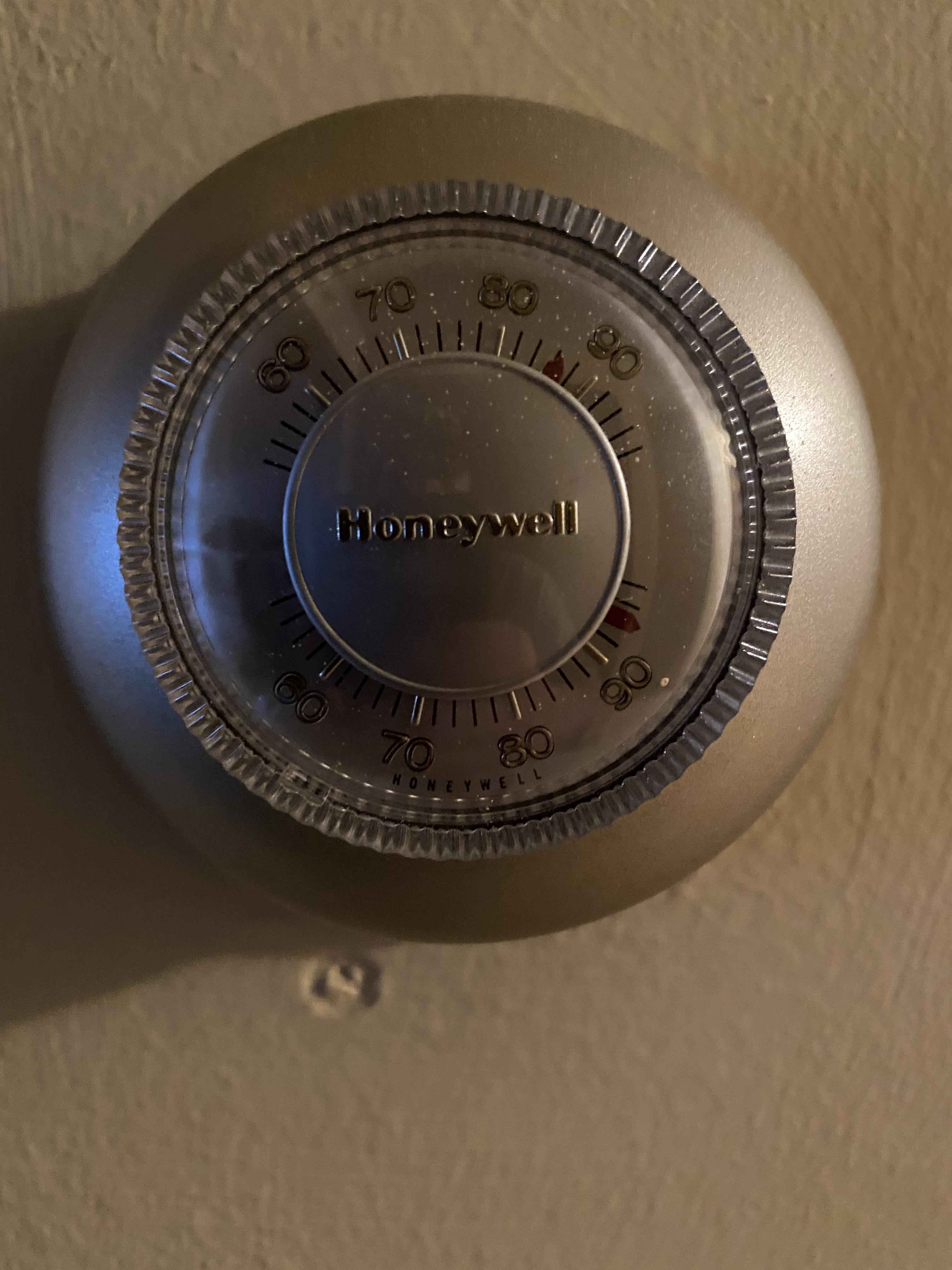 my dad refuses to use the air conditioner upstairs. the bottom dial is