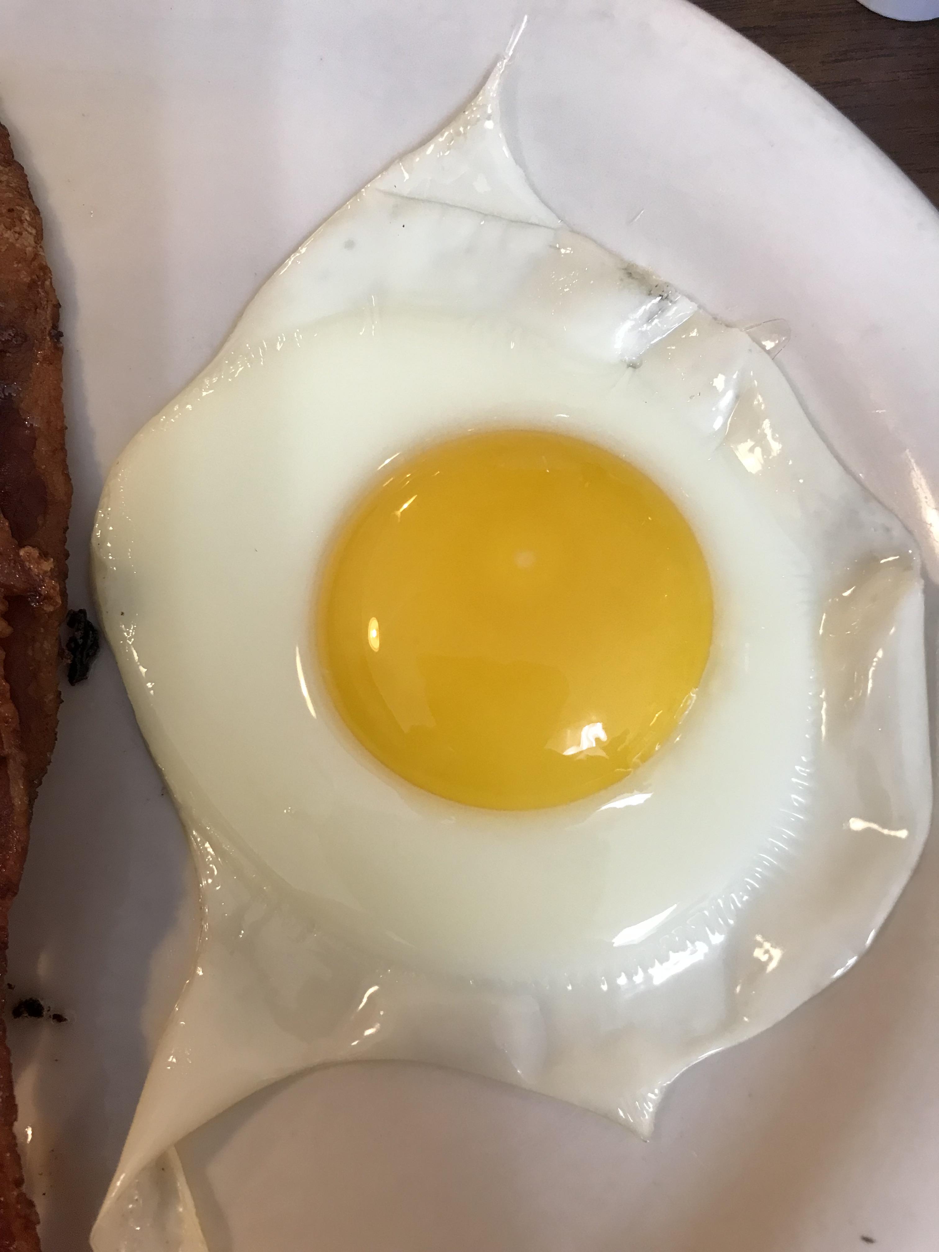 This fried egg I got this morning is so beautiful oddlysatisfying
