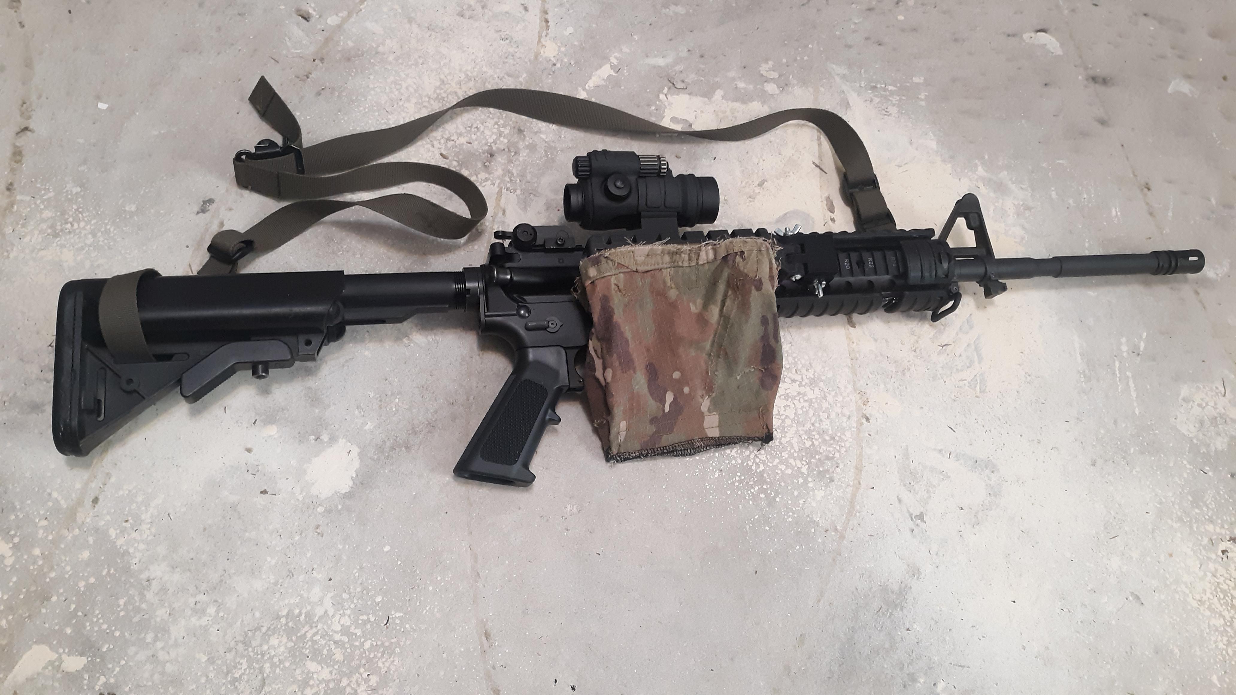 3D printed & hand sewn fliptoside brass catcher for pic rail. r/guns