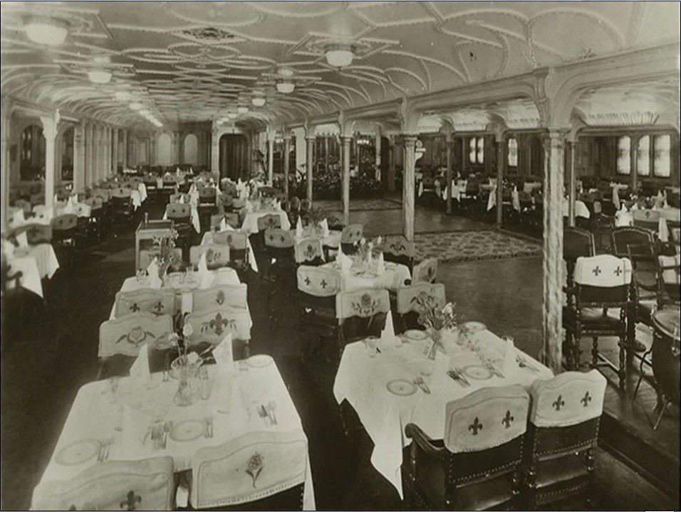 RMS Olympic 1st class dining room in the 1920s. The room received new