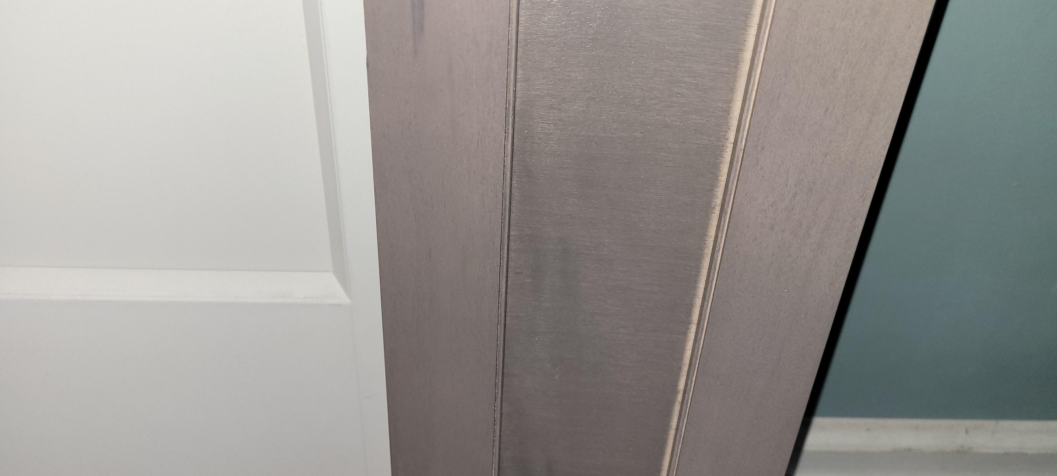 what baseboards and door trim would you use for this door and cabinets