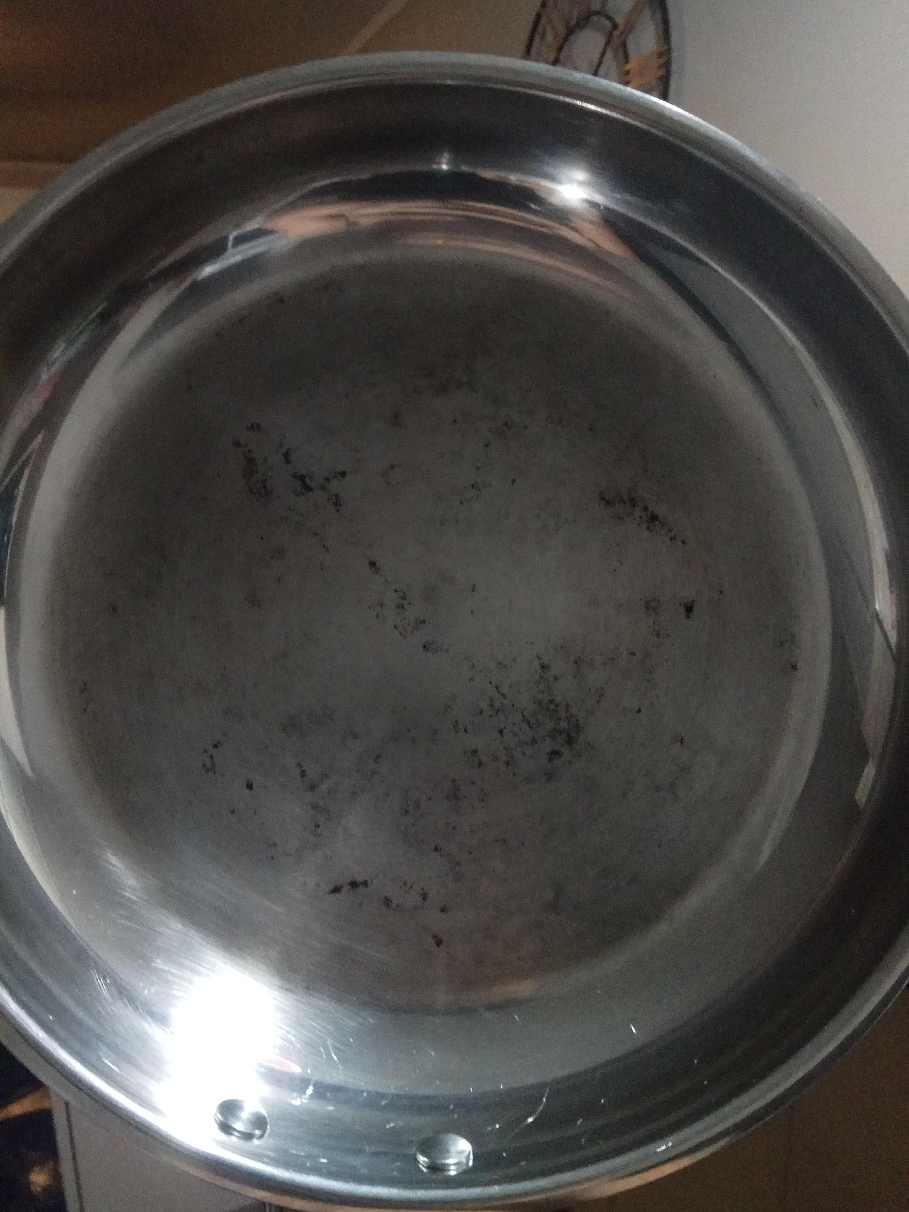 Stainless steel pan, boyfriend burned domething on to it a while back