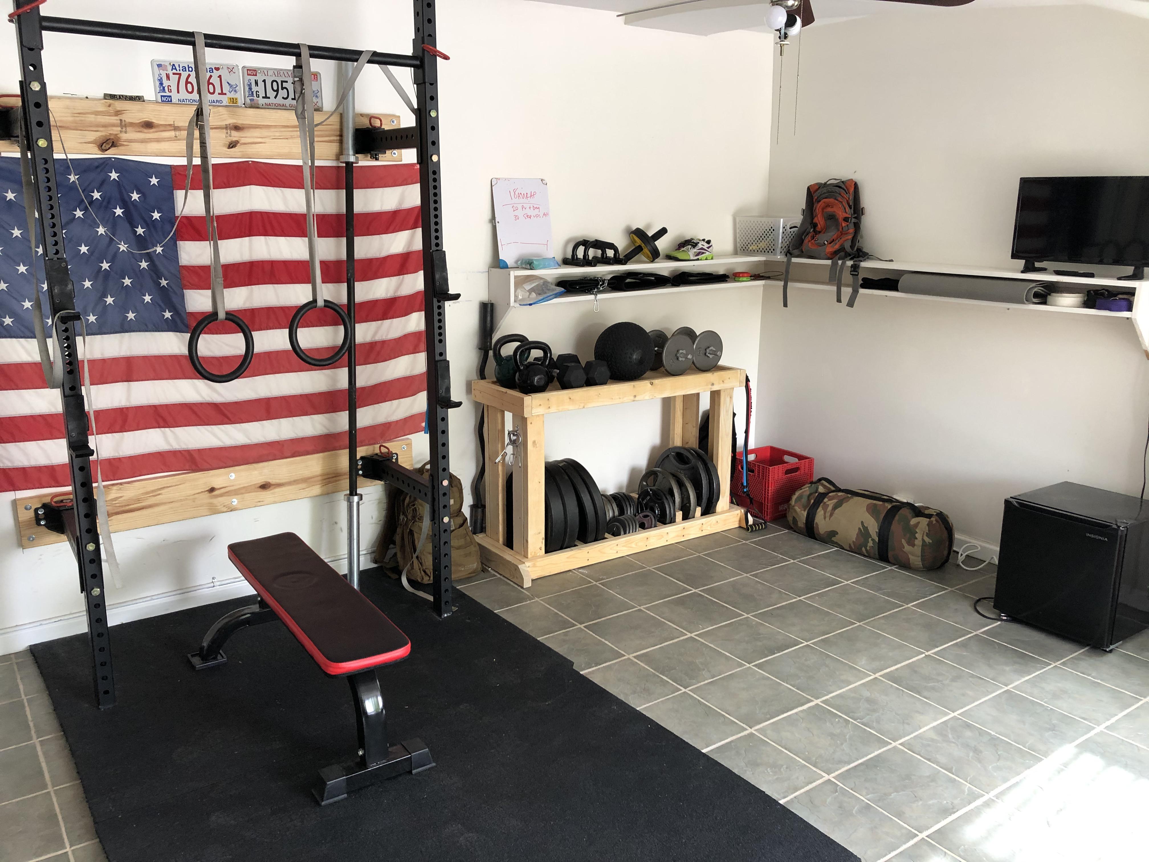 Picture of the full gym after my DIY weight shelf is in. r/homegym