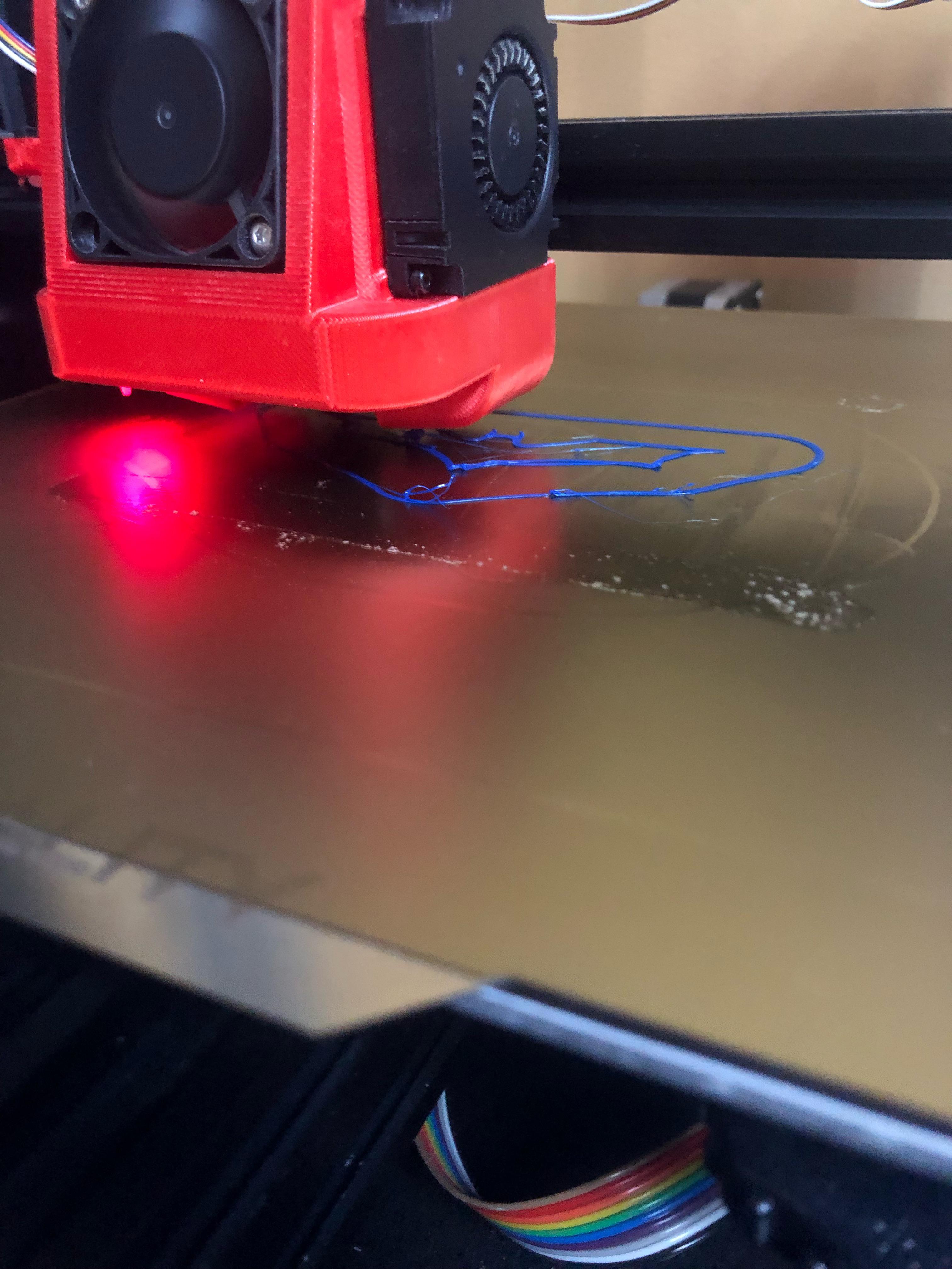 But why is it barely sticking to the bed, going on the nozzle instead