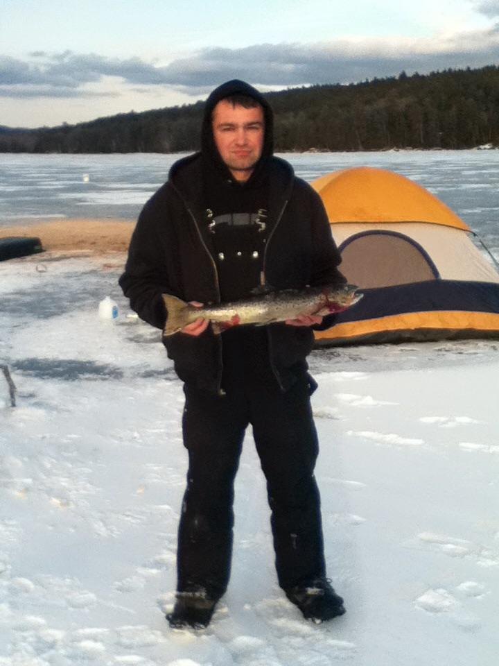 Beautiful brown trout through the ice Schroon Lake, NY r/Fishing