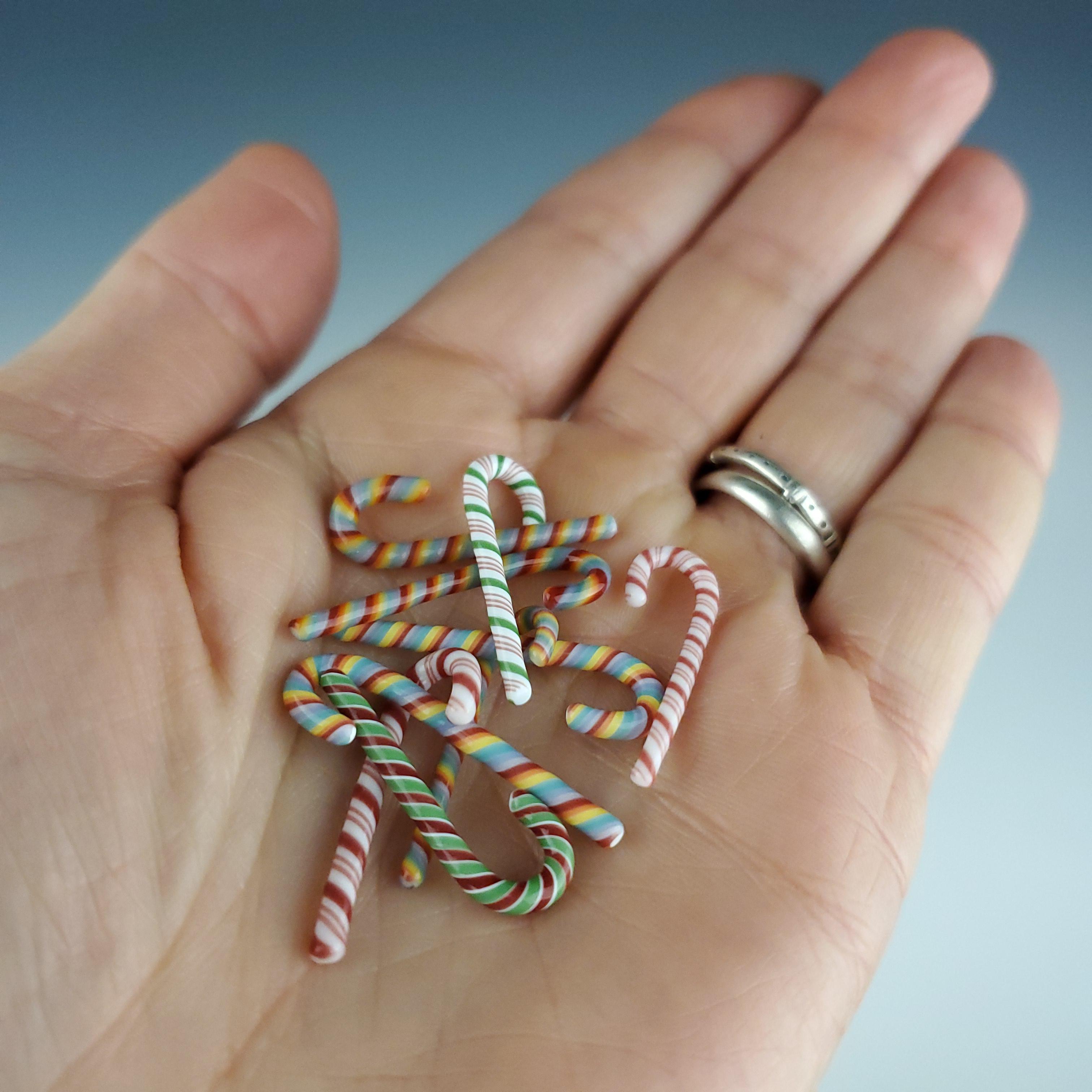 This time of year I love making miniature glass candy canes! Made with