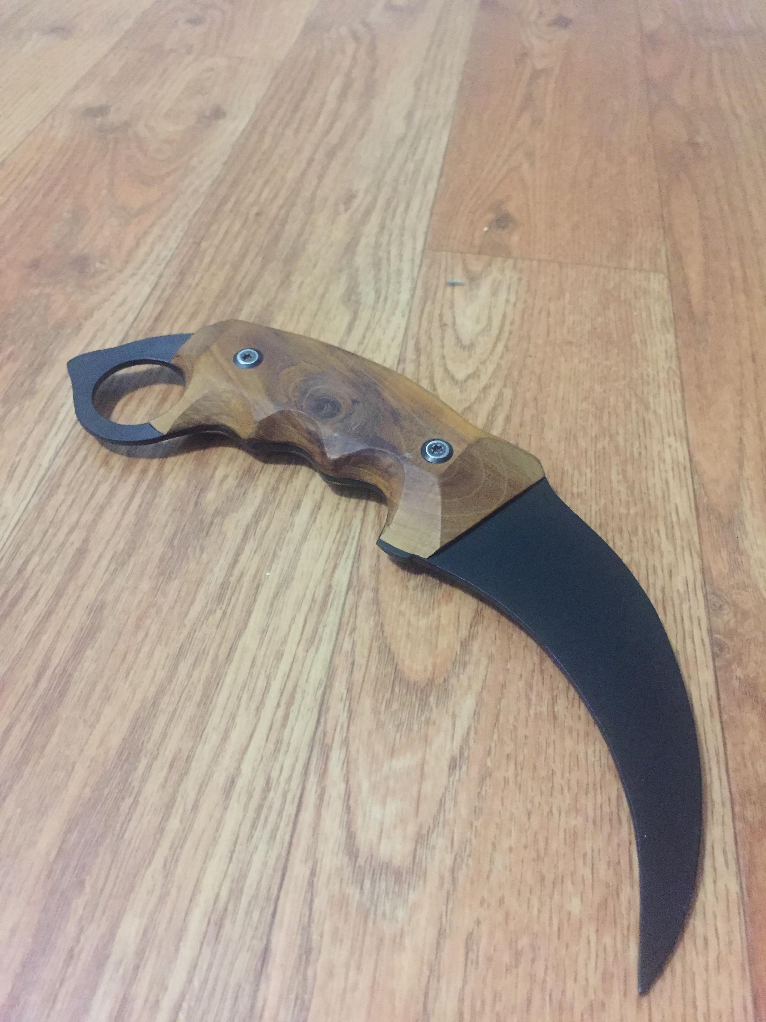 My first homemade knife, made out of a old saw blade and osage orange