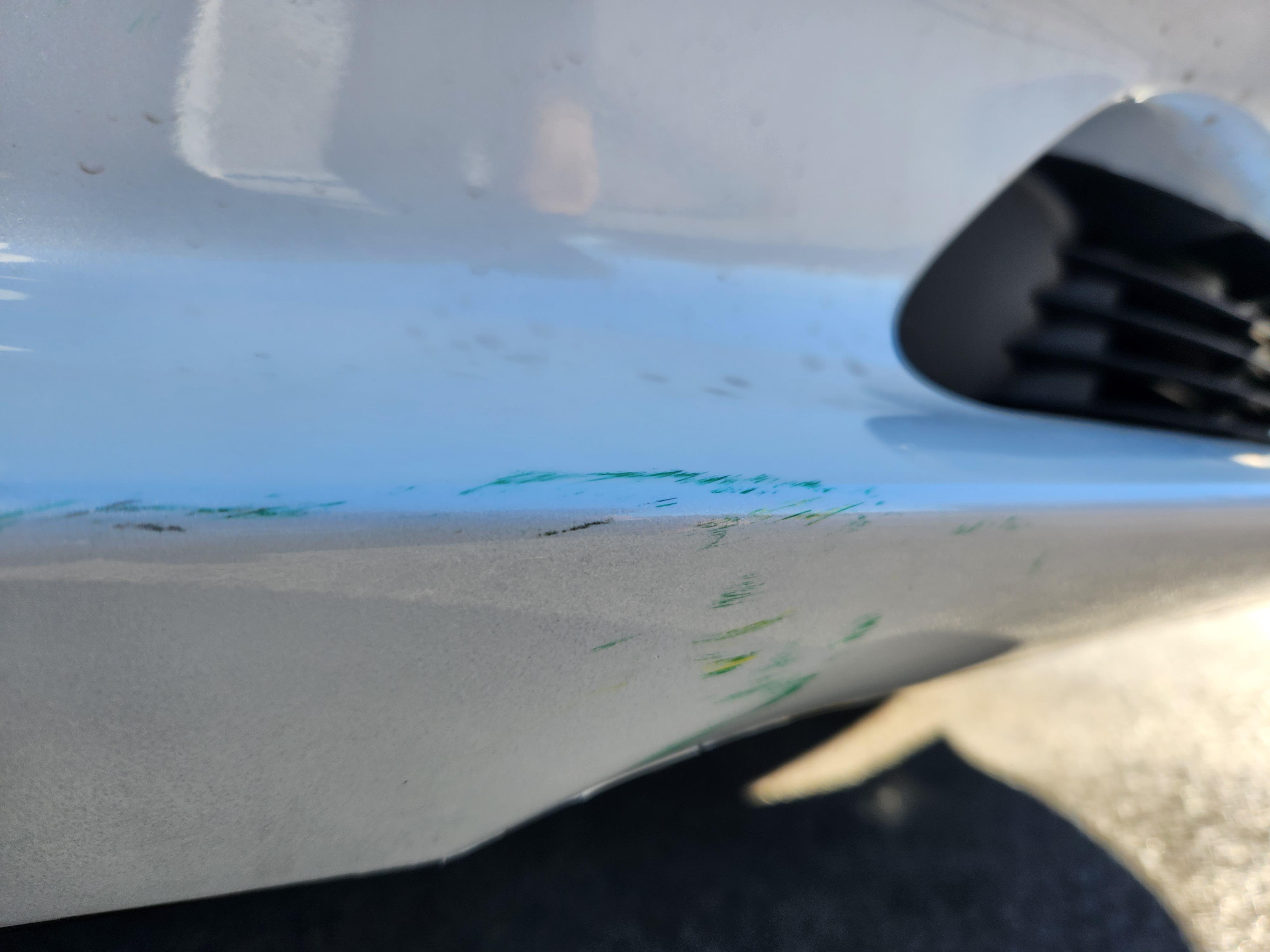 Tesla Model 3 scratched by Tesla Service Center. The person who took