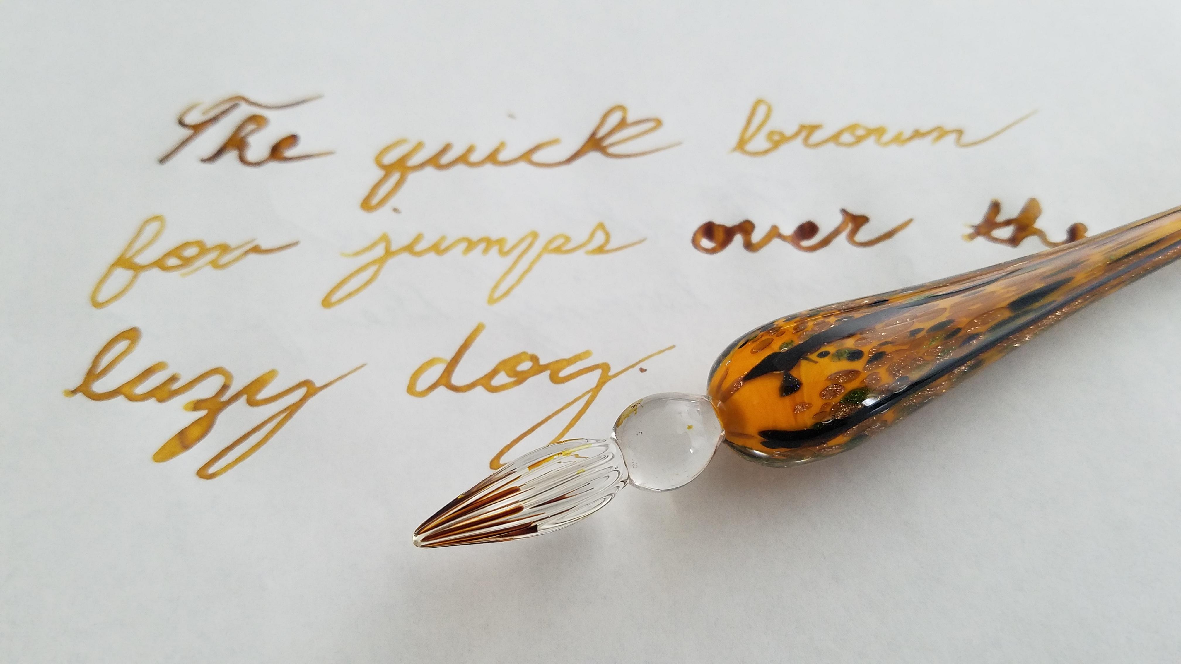 The tip of my glass dip pen broke... so it went from a fine to an extra