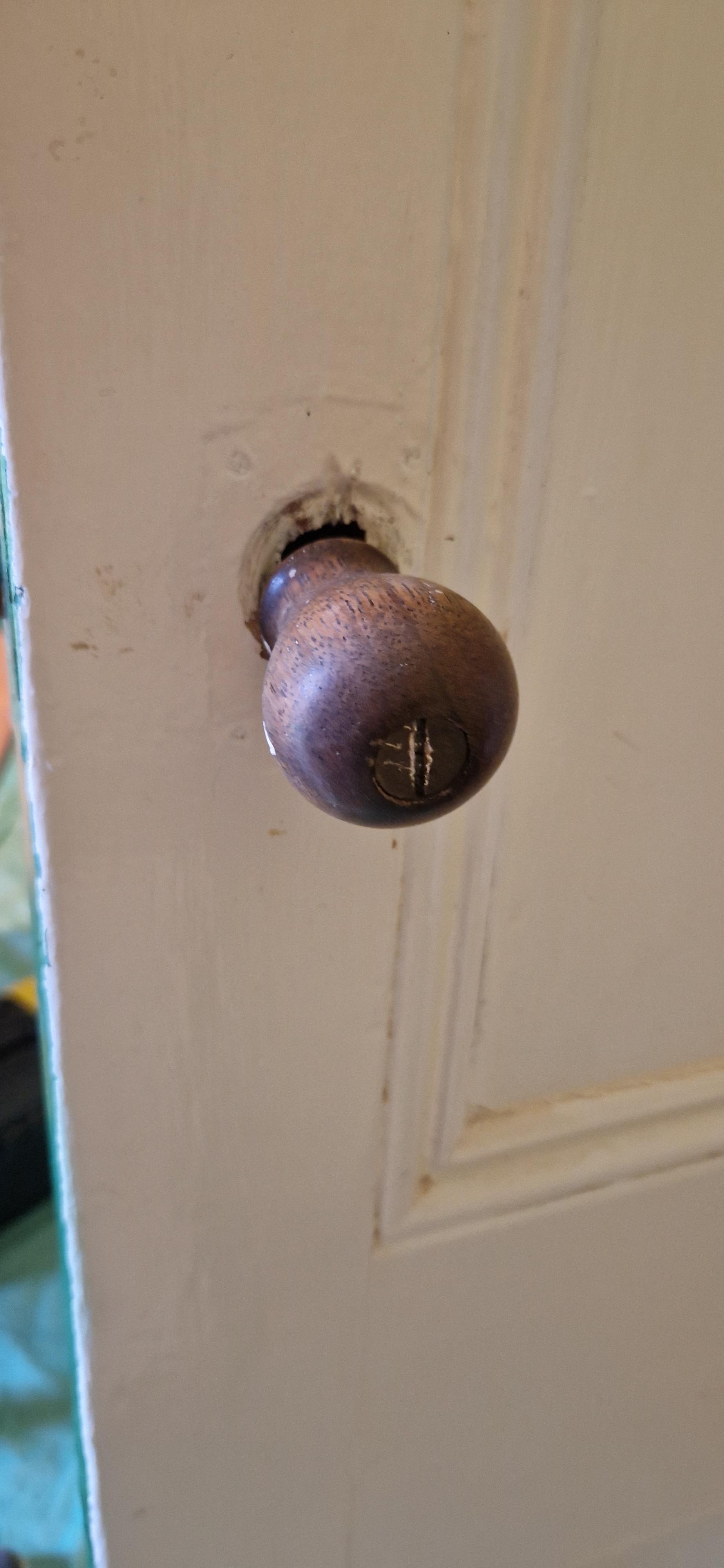 This door knob is totally siezed up and I can't unscrew it. Any ideas