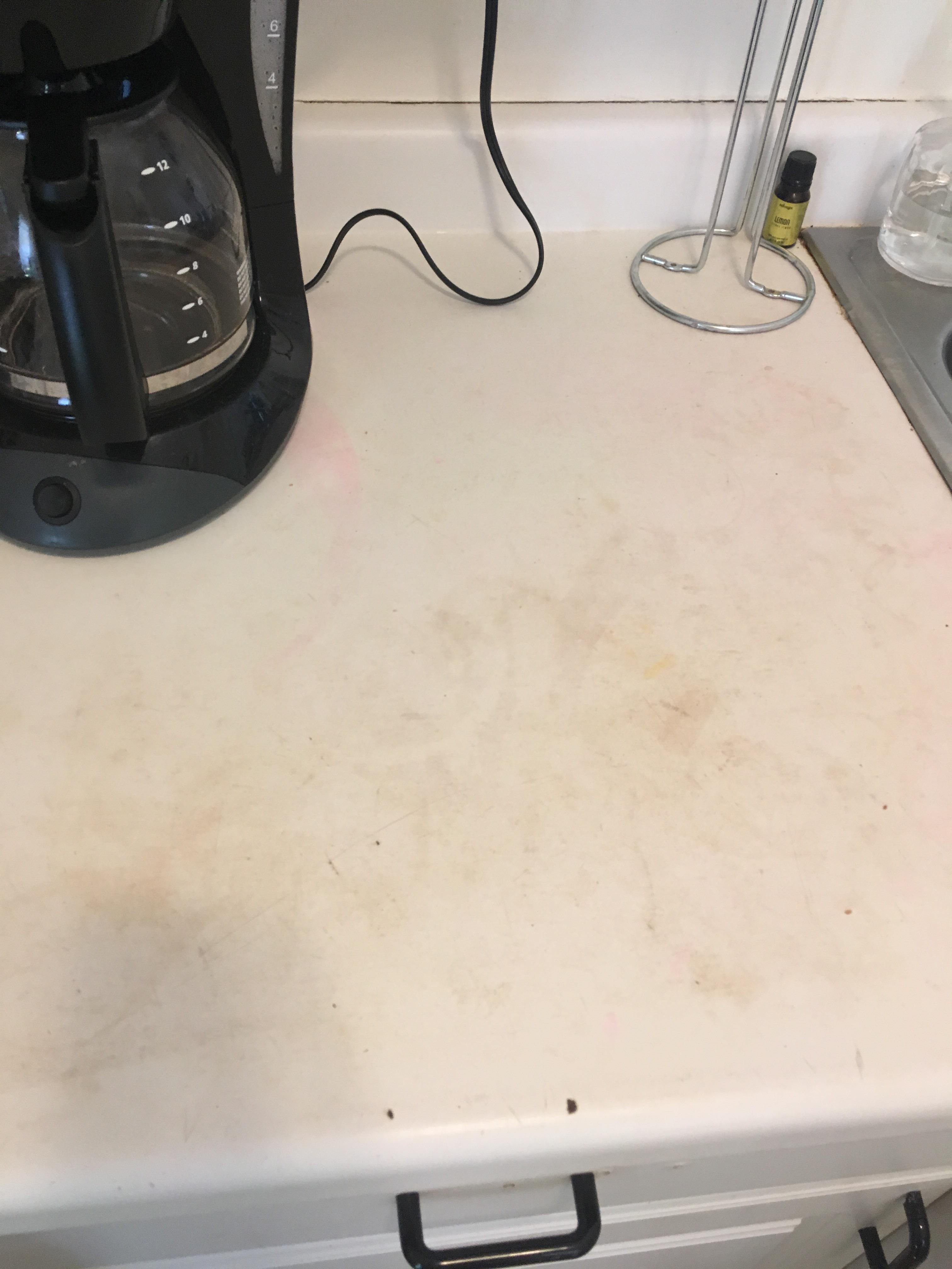 any tips to remove the stains on this countertop? r/CleaningTips