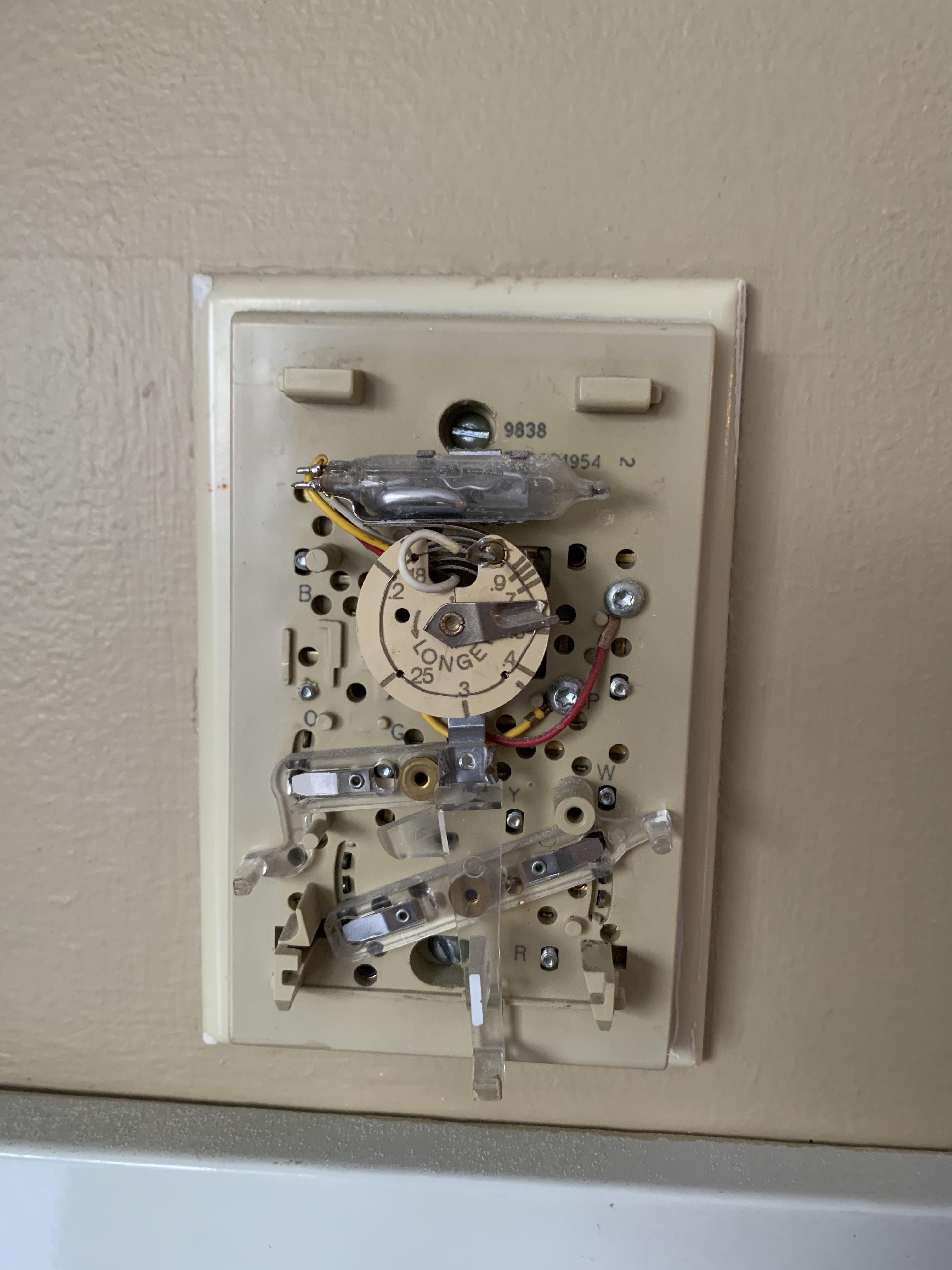 My thermostat uses a mercury switch to turn on & off. : r/mildlyinteresting